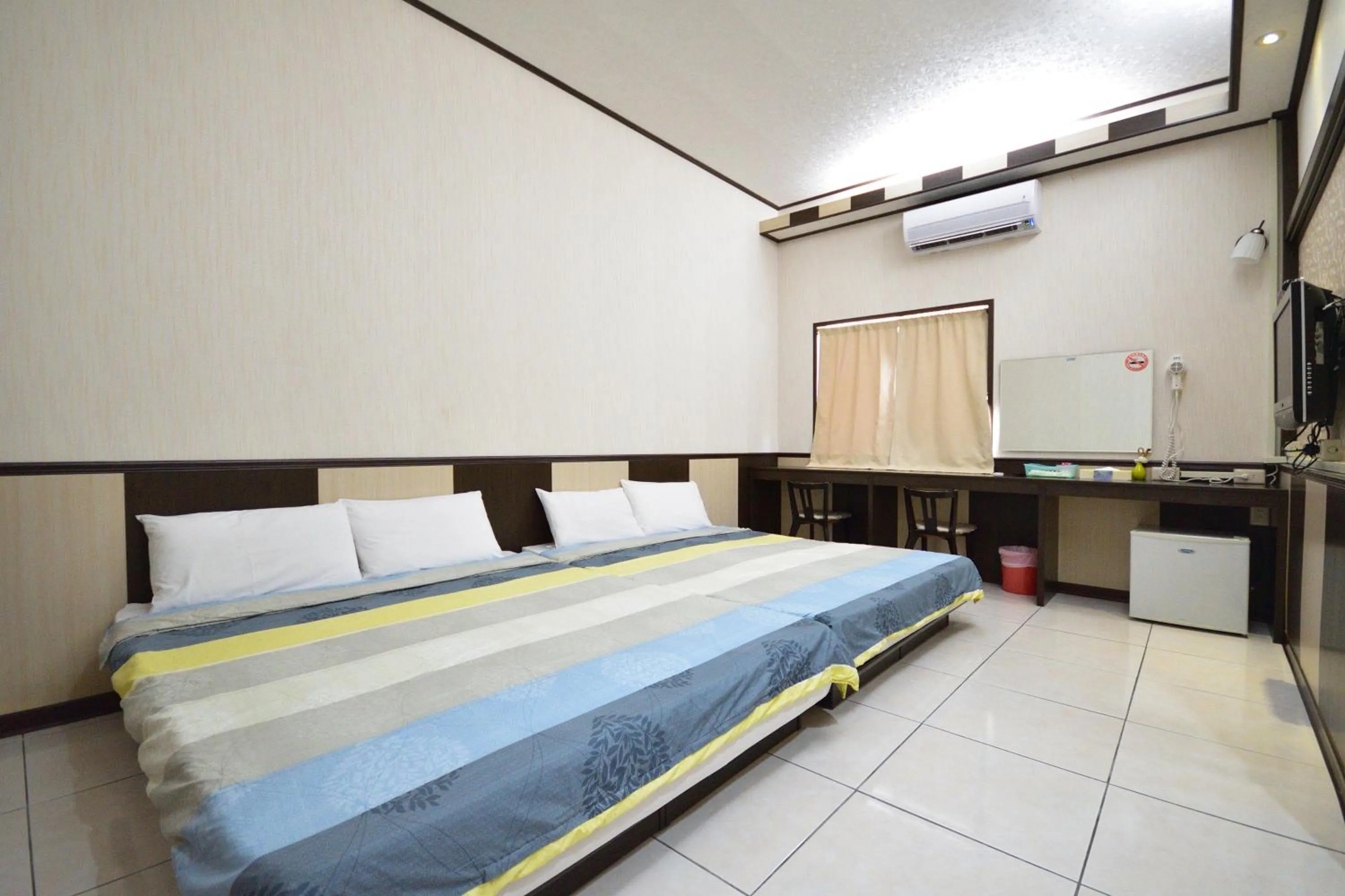 Bed in Luyi Ludao B&B