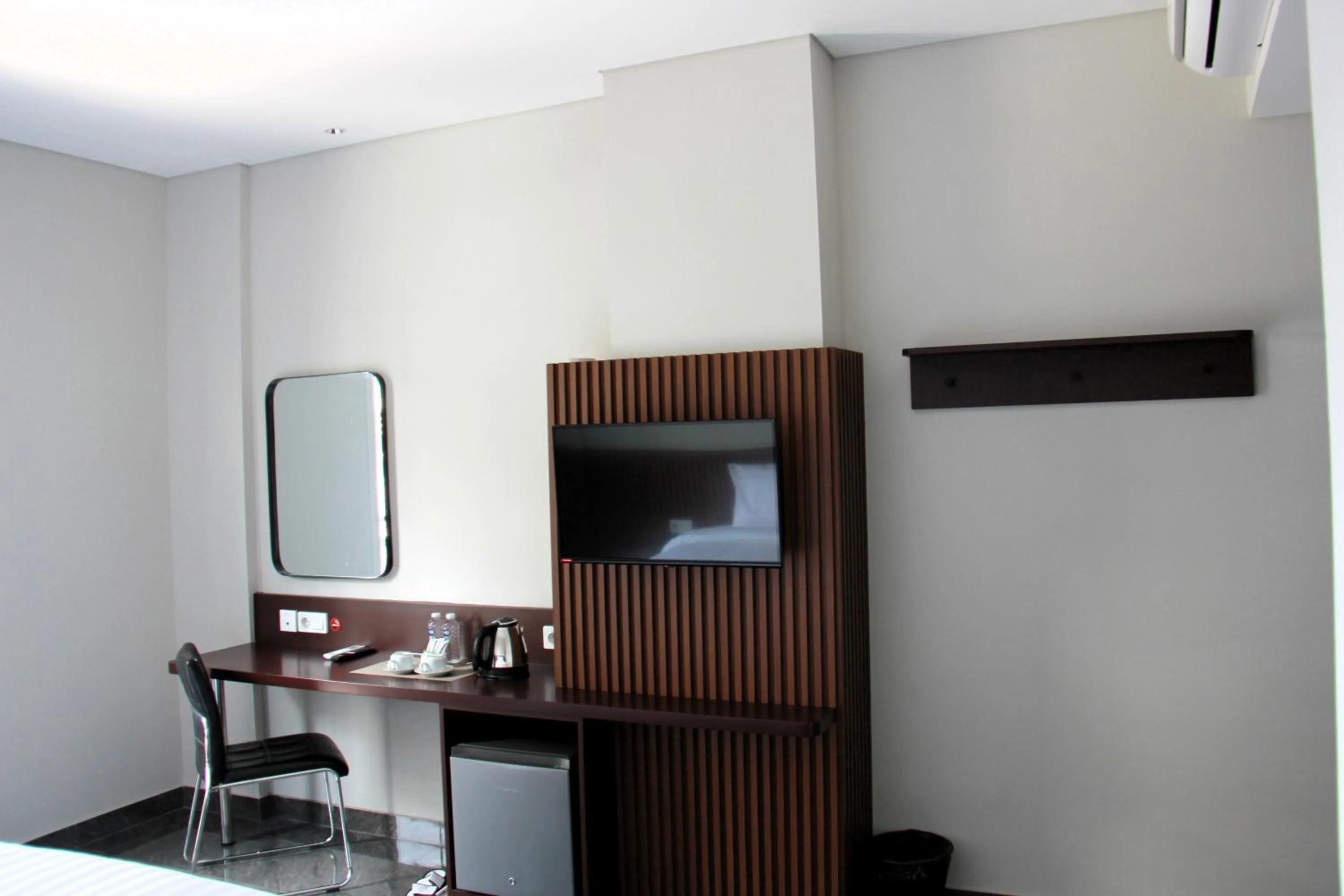 Communal lounge/ TV room in Moscato Hotel