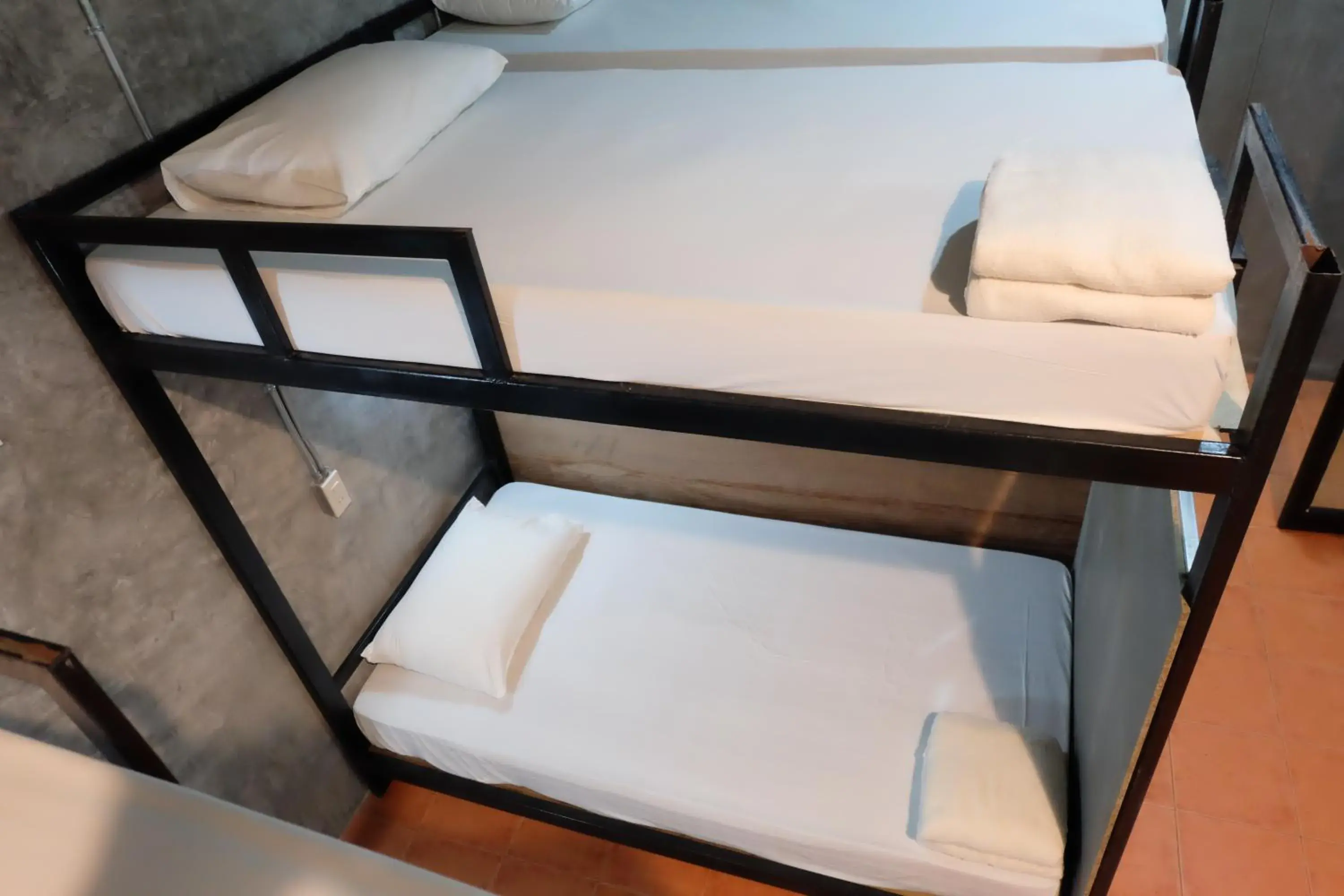 Bunk Bed in Mixed Dormitory Room in White Jail at Koh Tao Hostel Bunk Bed in Mixed Dormitory Room in White Jail at Koh Tao Hostel