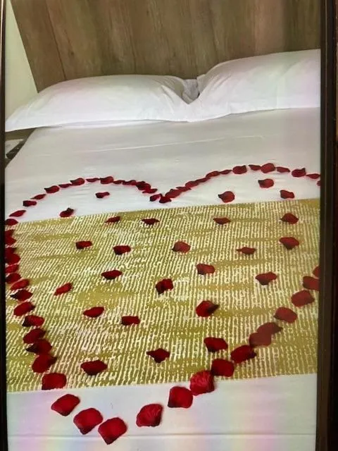 Bed in Astor Court Hotel