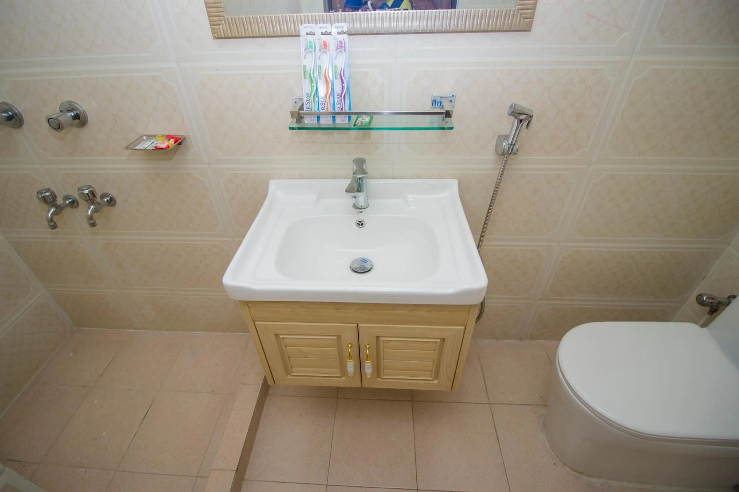 Shower in Hotel Progati Inn Ltd.