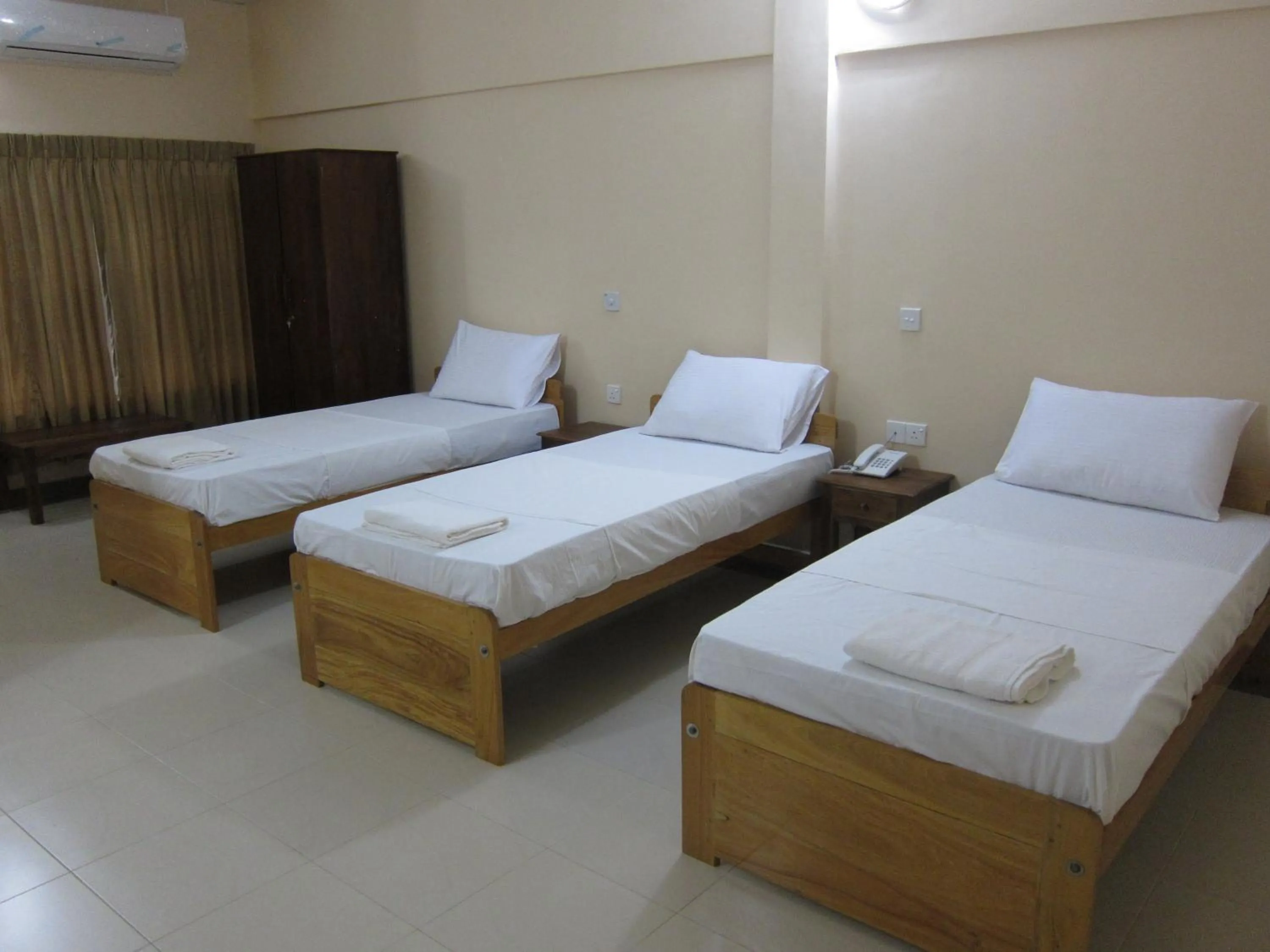 Bed in Hotel Oviya