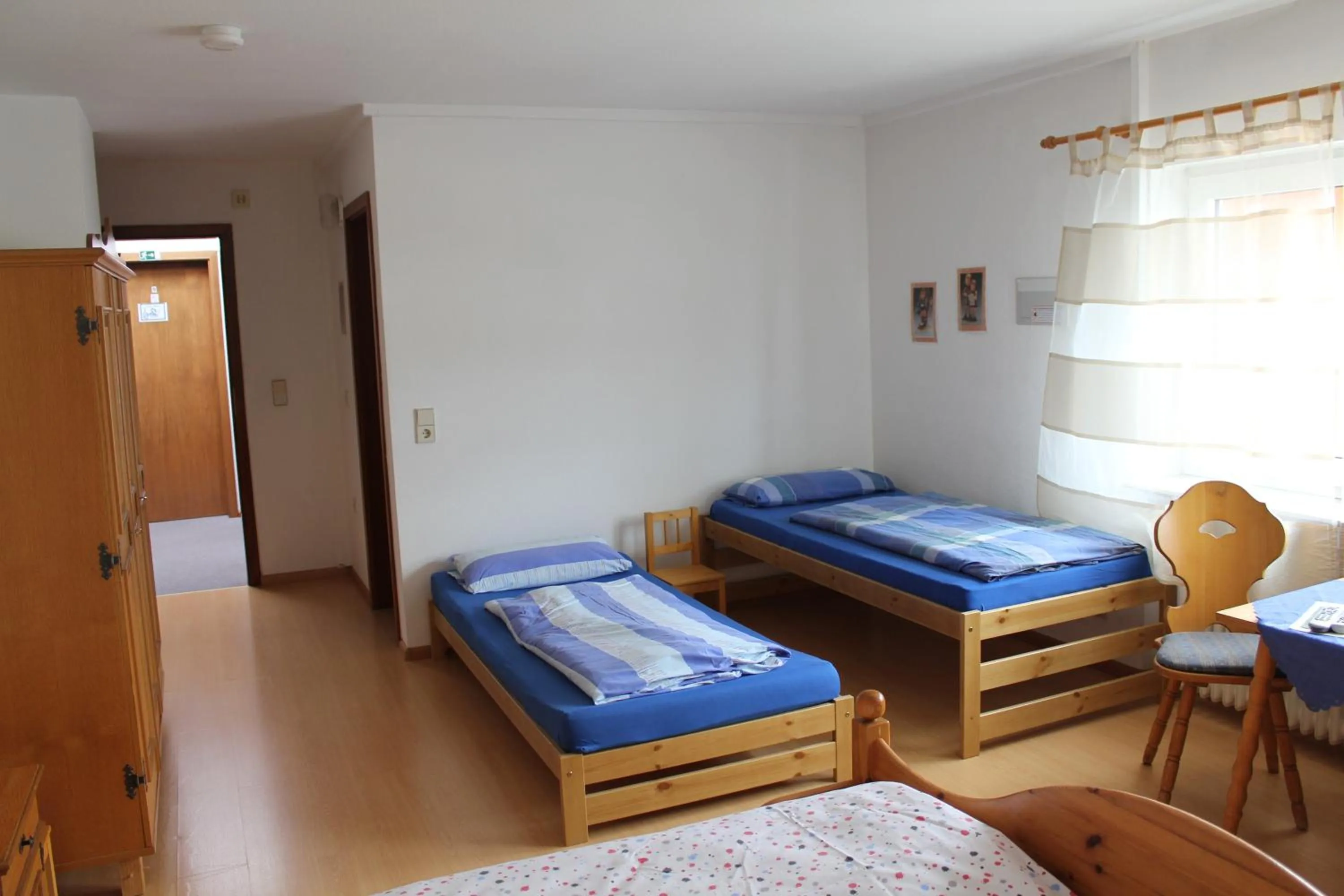 Photo of the whole room, Bed in Gasthaus Mösle