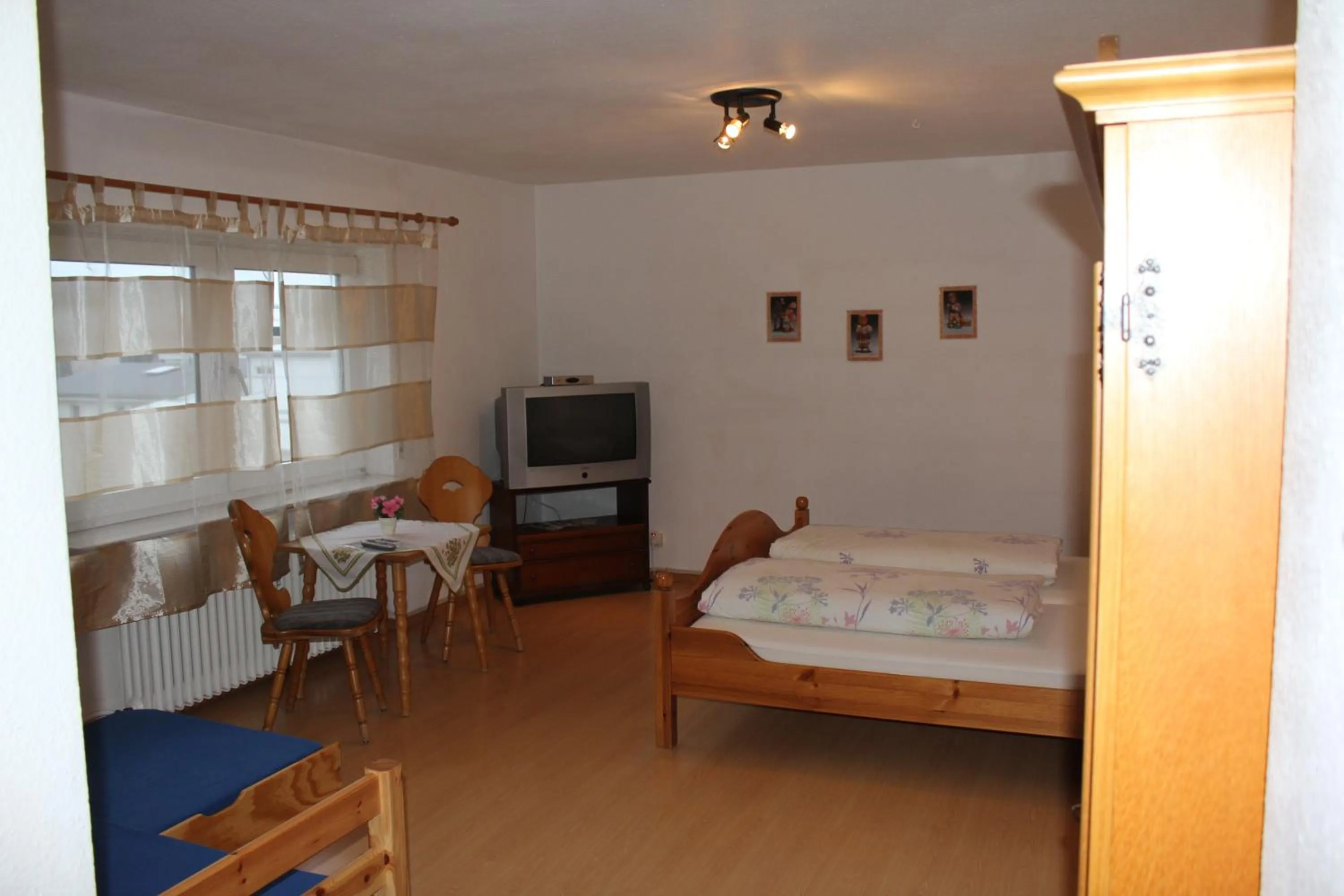 Photo of the whole room, Bed in Gasthaus Mösle