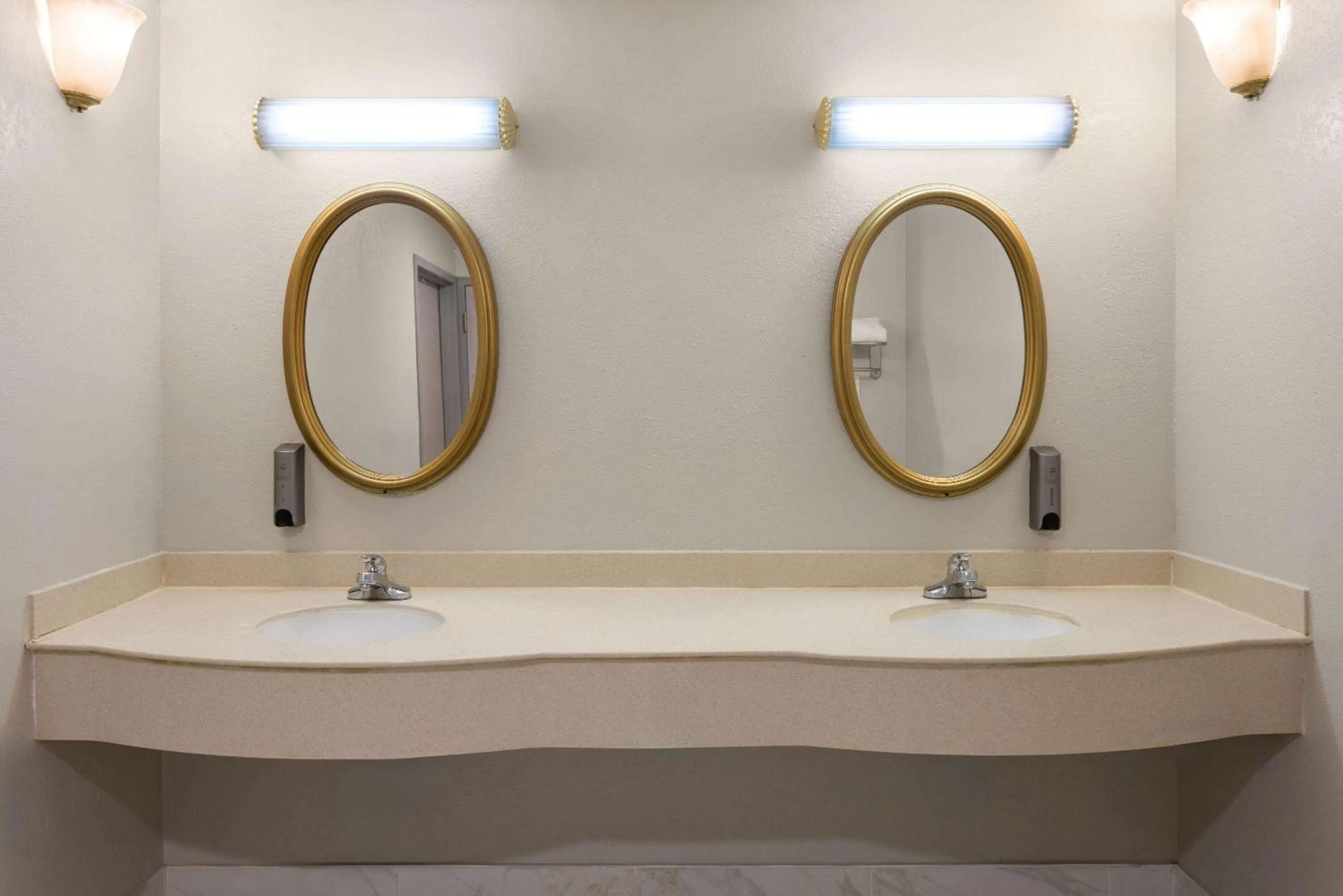 Bathroom in Days Inn & Suites by Wyndham Albany