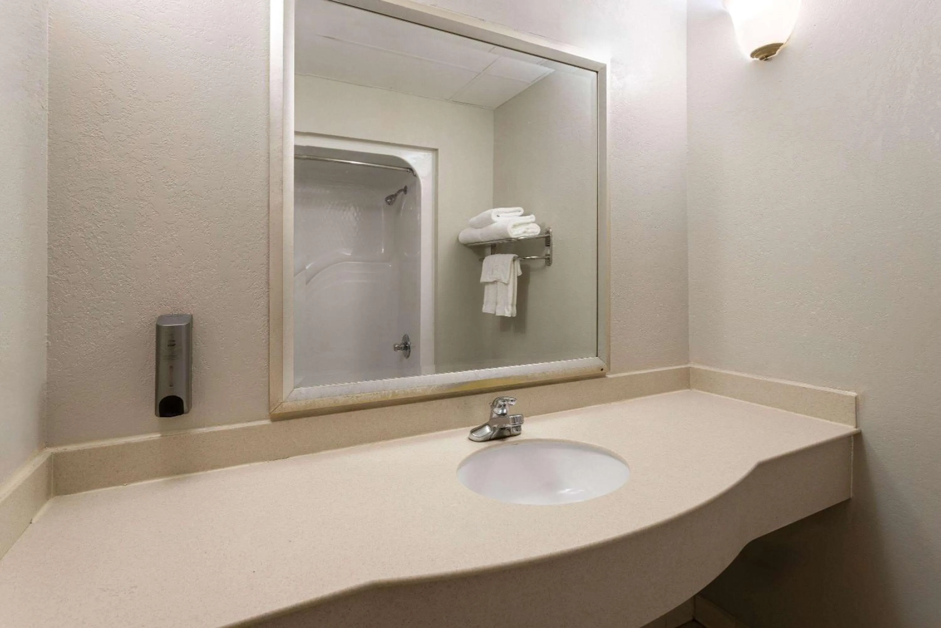 Bathroom in Days Inn & Suites by Wyndham Albany
