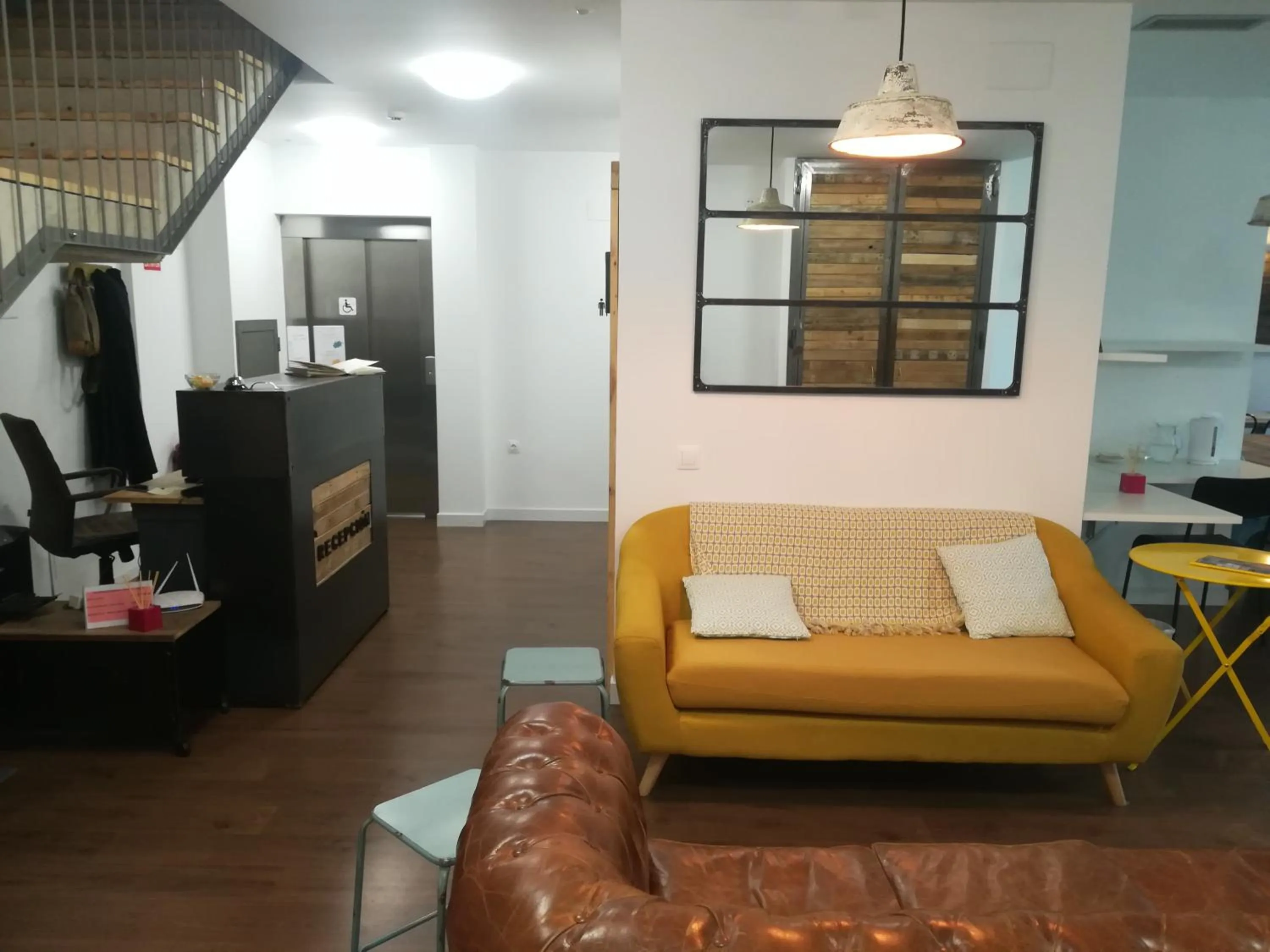 Communal lounge/ TV room in Agora Hostel