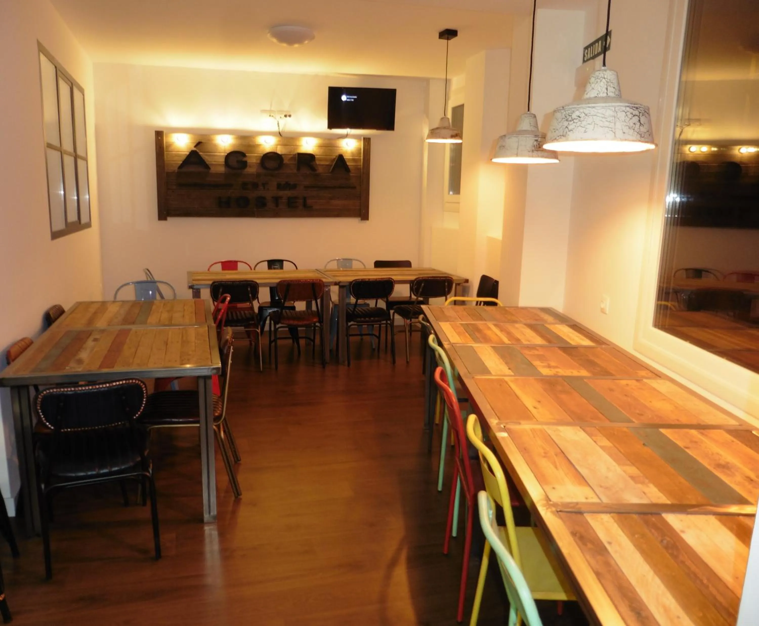 Communal lounge/ TV room in Agora Hostel