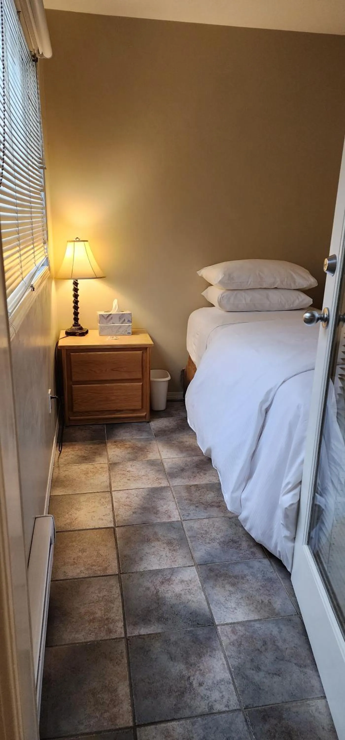 Bed in Times Square Suites Hotel