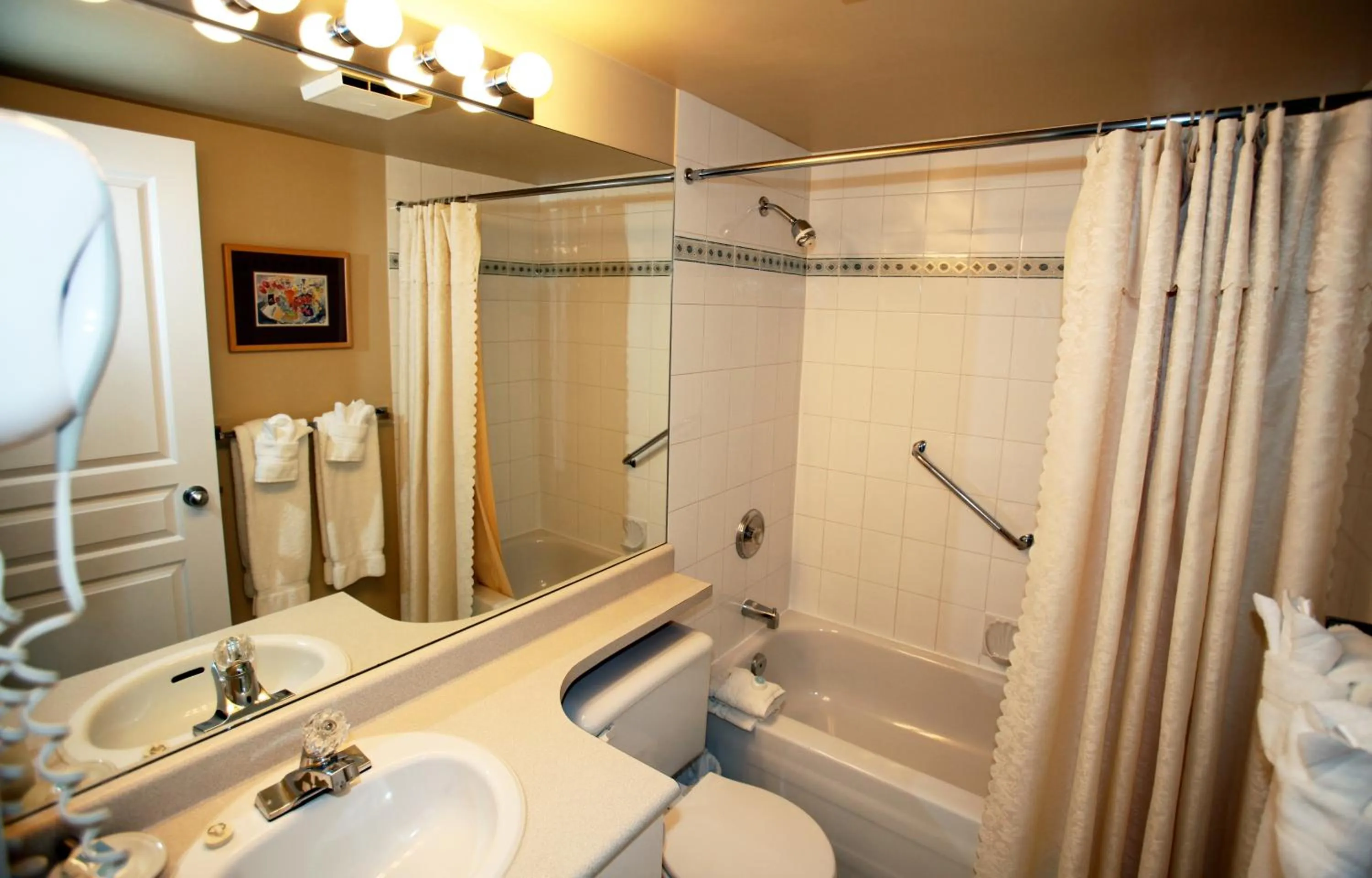 Bathroom in Times Square Suites Hotel