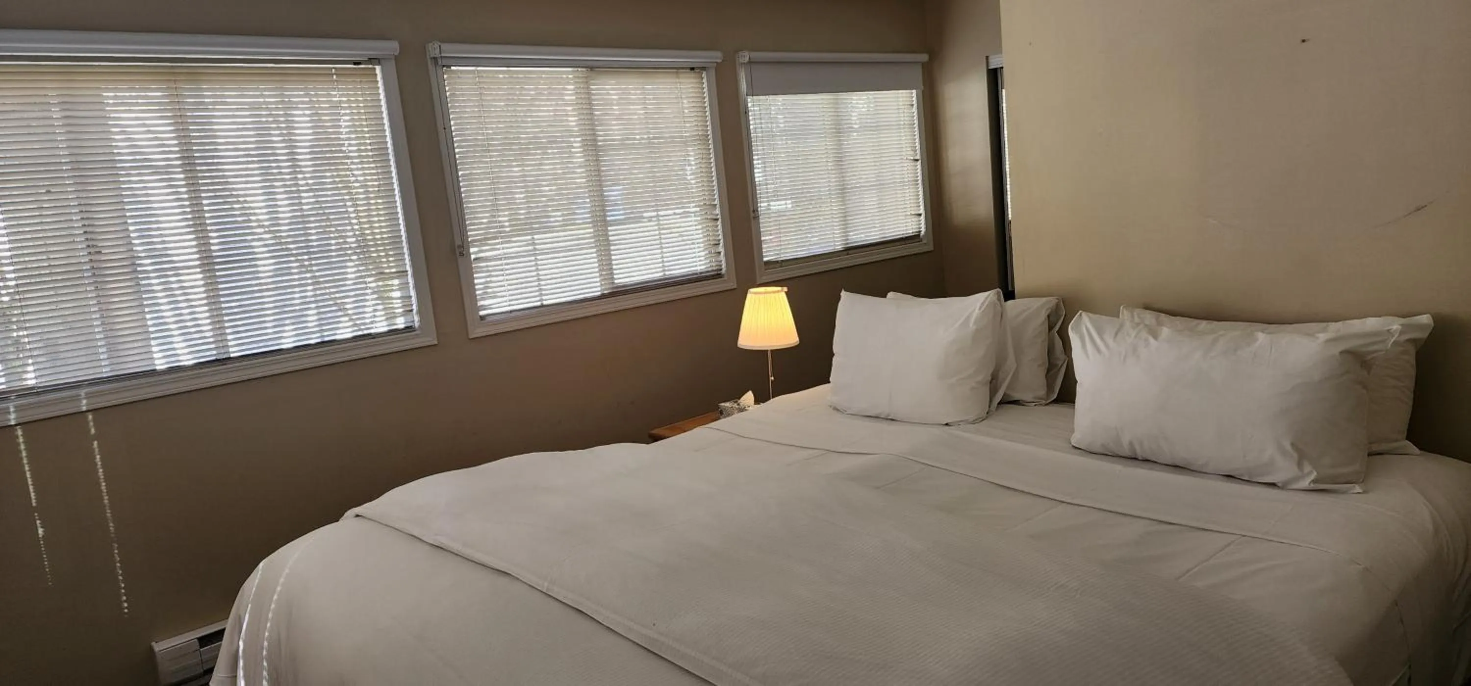 Bed in Times Square Suites Hotel