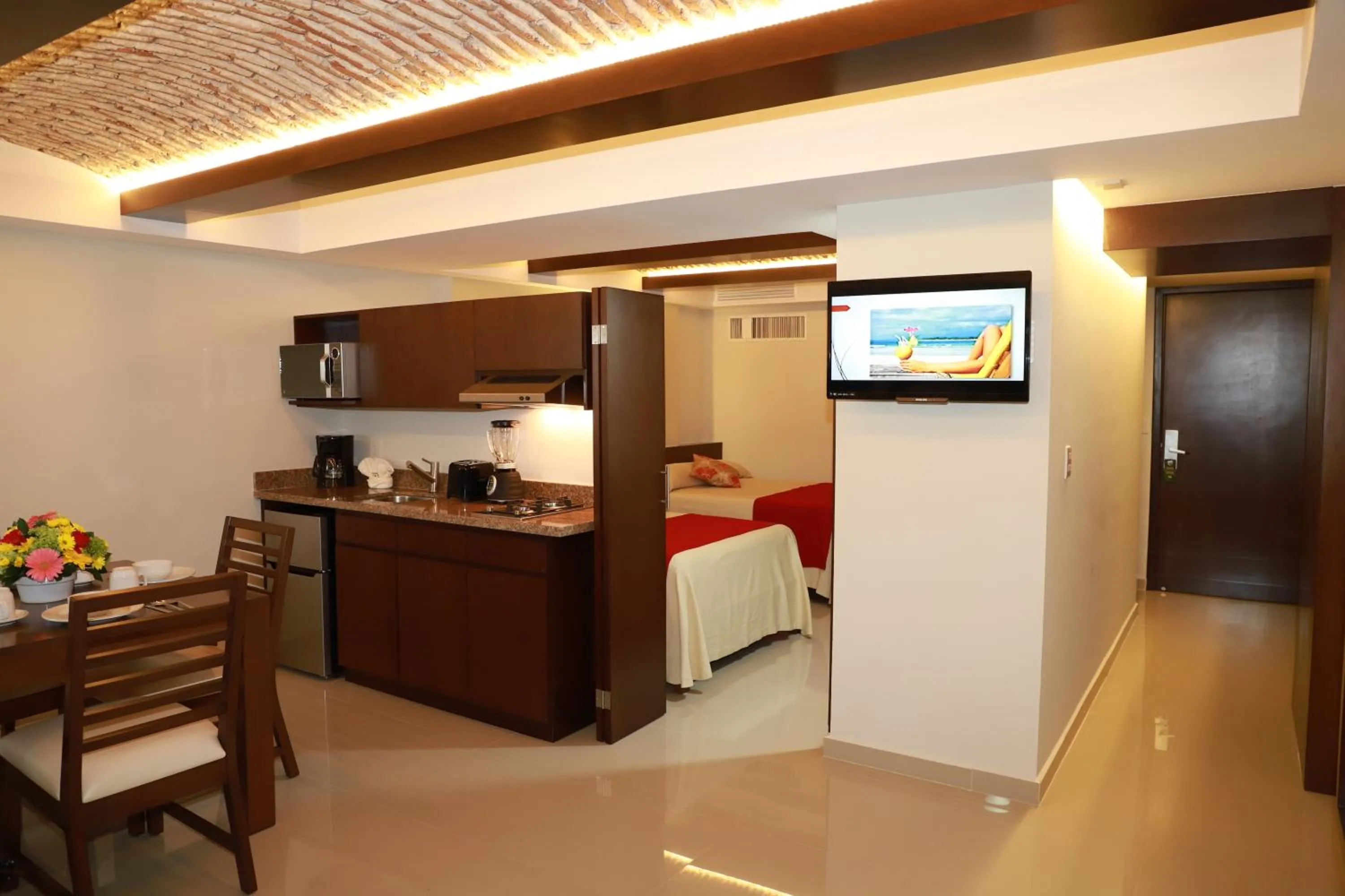 Property building, Bed in Las Flores Beach Resort