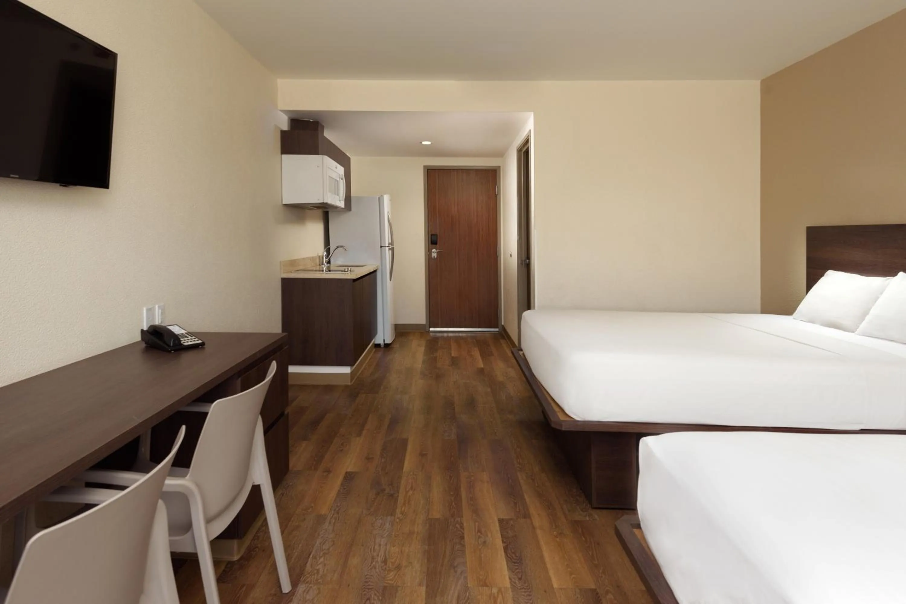 Bed in Extended Suites Mexicali Catavina
