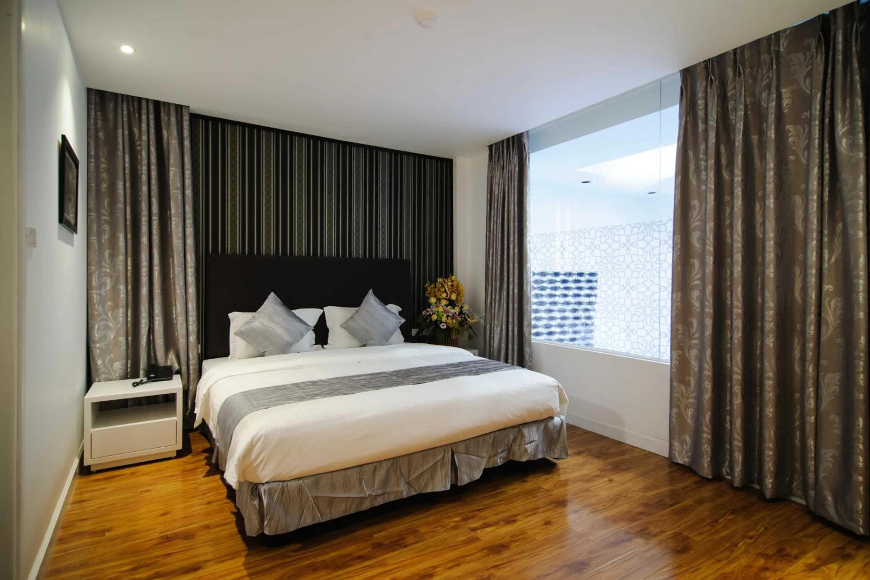 Bed in Riverside Boutique Hotel