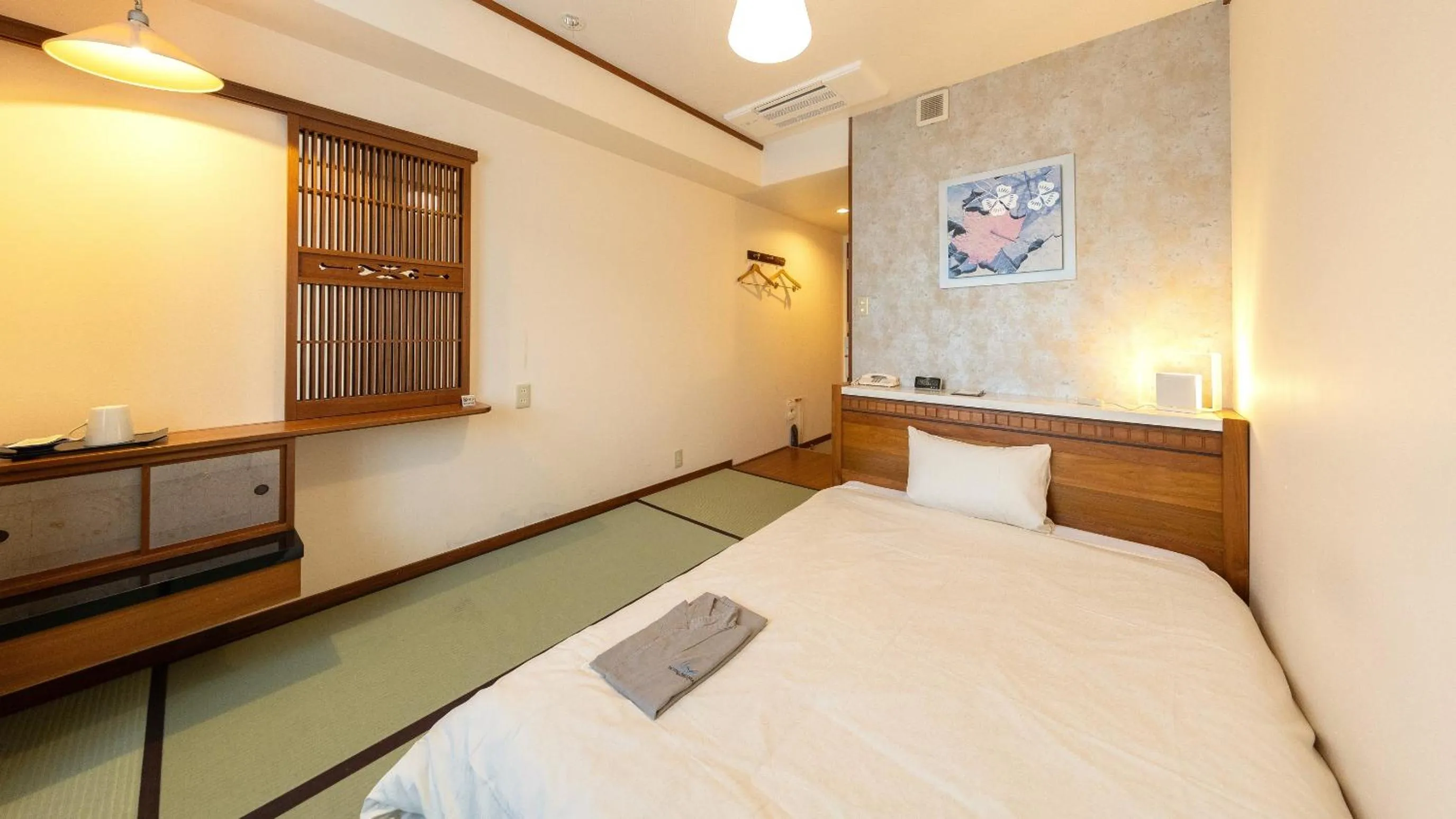 Bed in Hotel BELLMARE ホテルベルマーレ