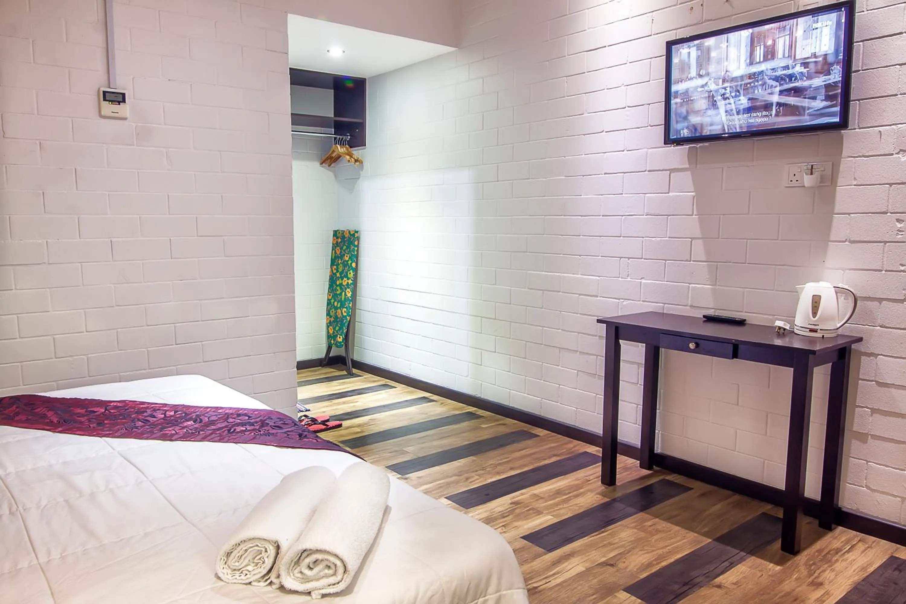 Bed in Myvilla Langkawi Hotel