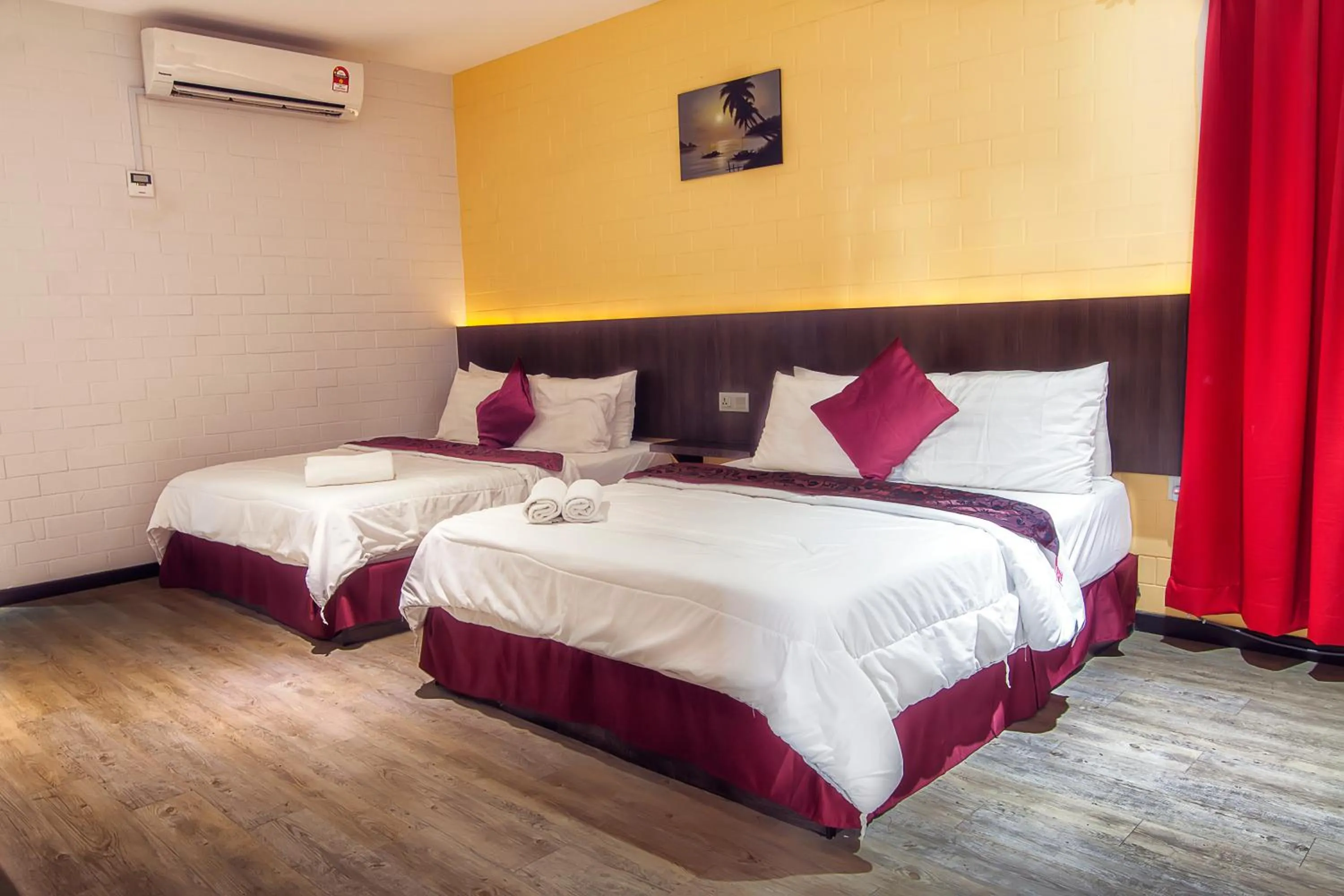 Bed in Myvilla Langkawi Hotel