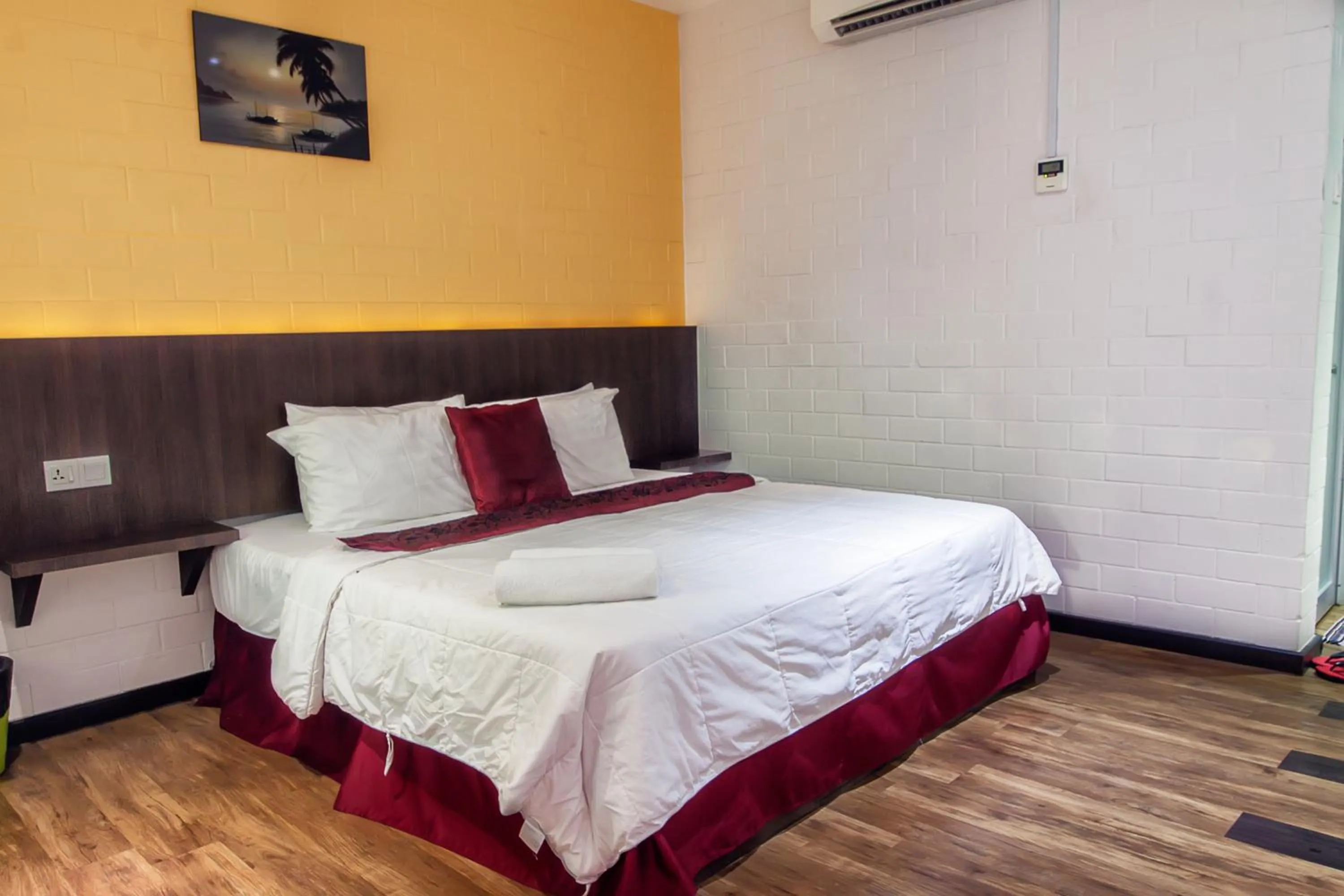 Bed in Myvilla Langkawi Hotel