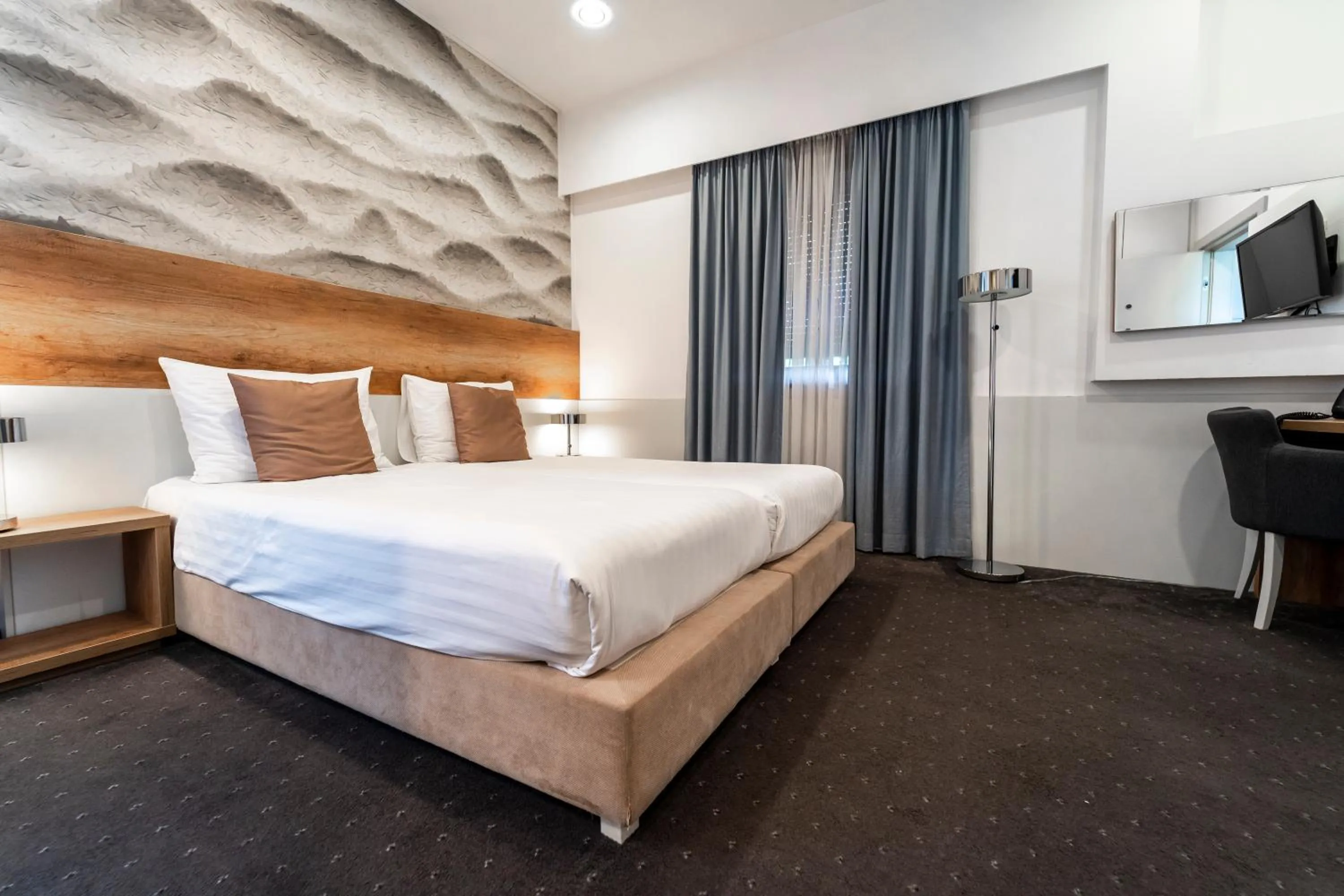 Bed in Hotel Santiny