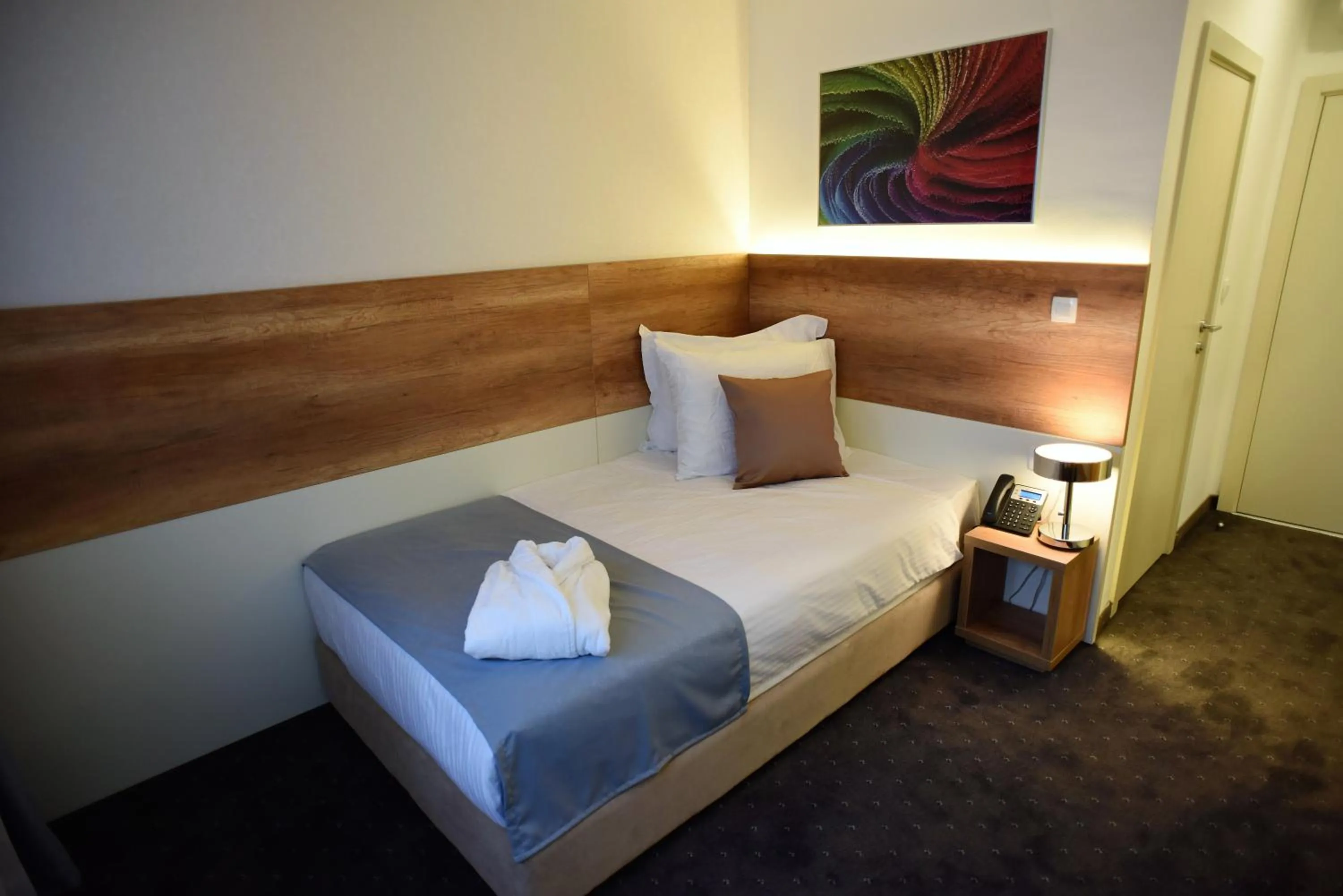 Bed in Hotel Santiny