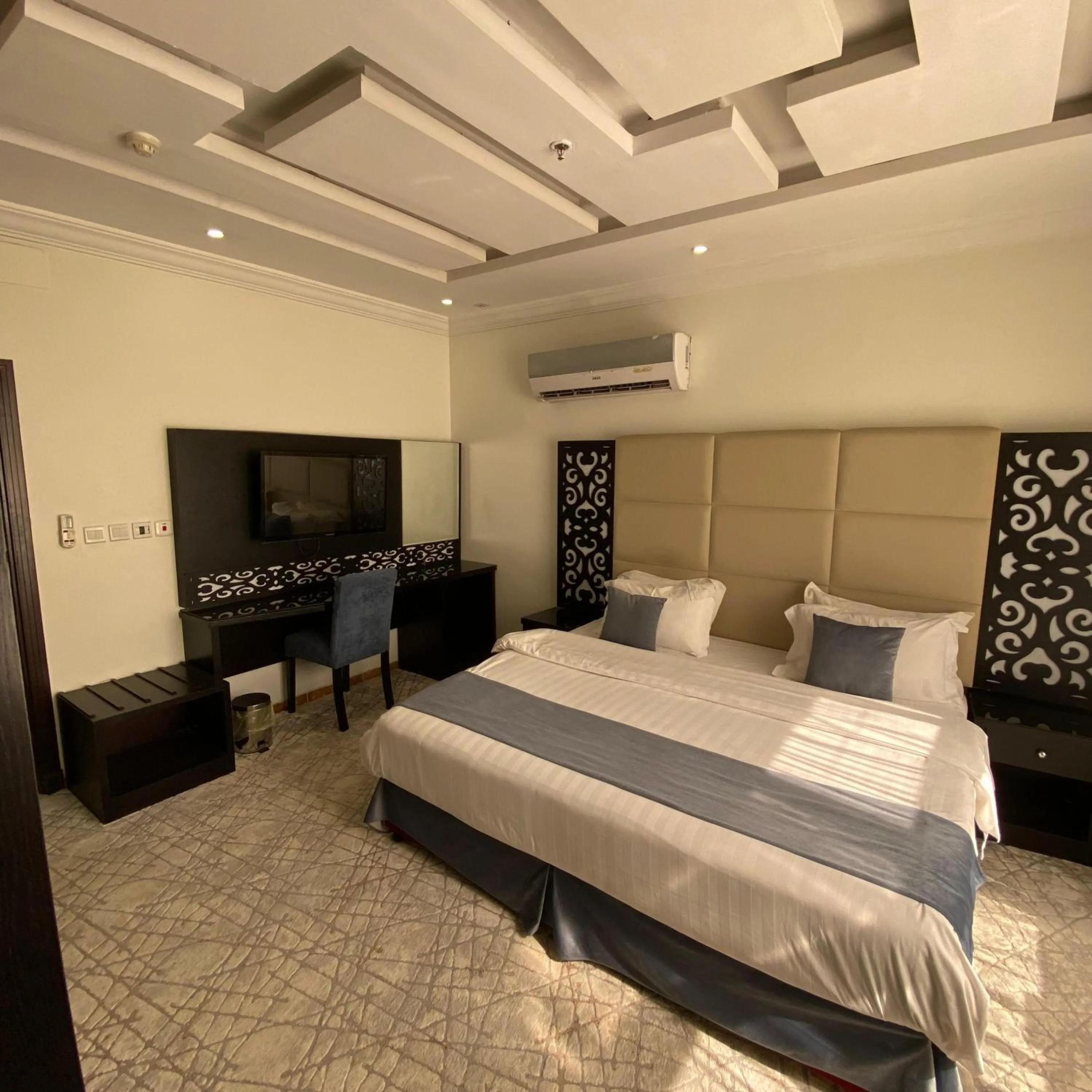 Bed in City Center Plaza Aparthotel