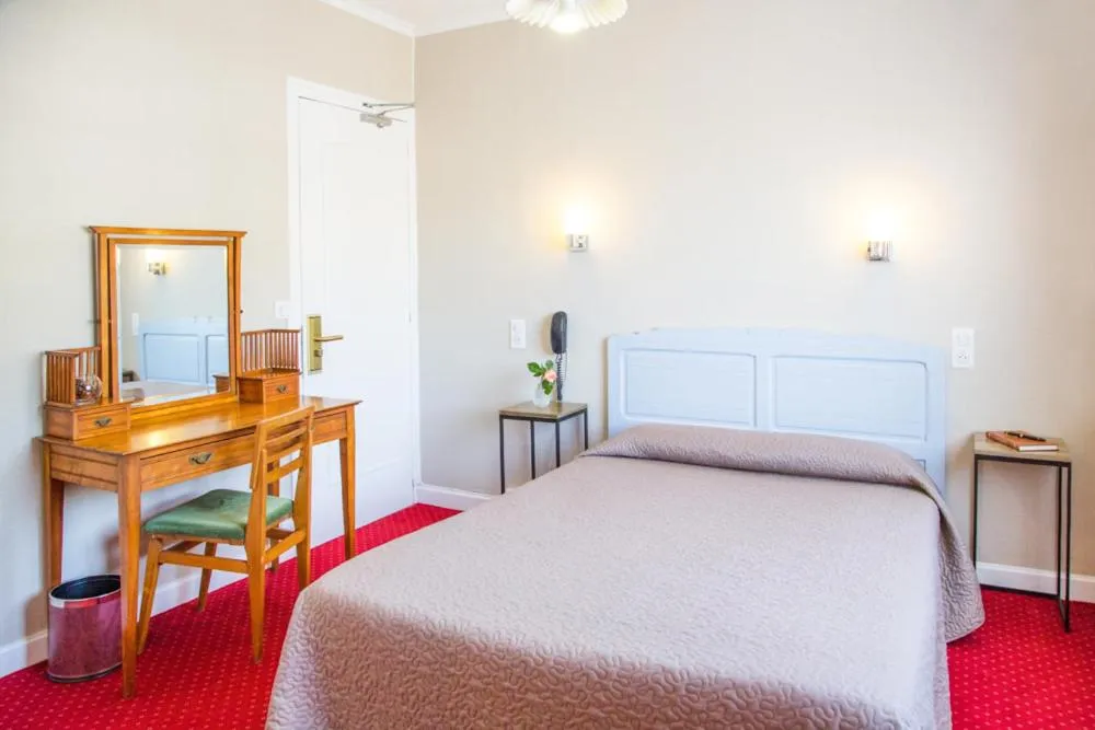 Bedroom in Hostellerie de La Roseraie