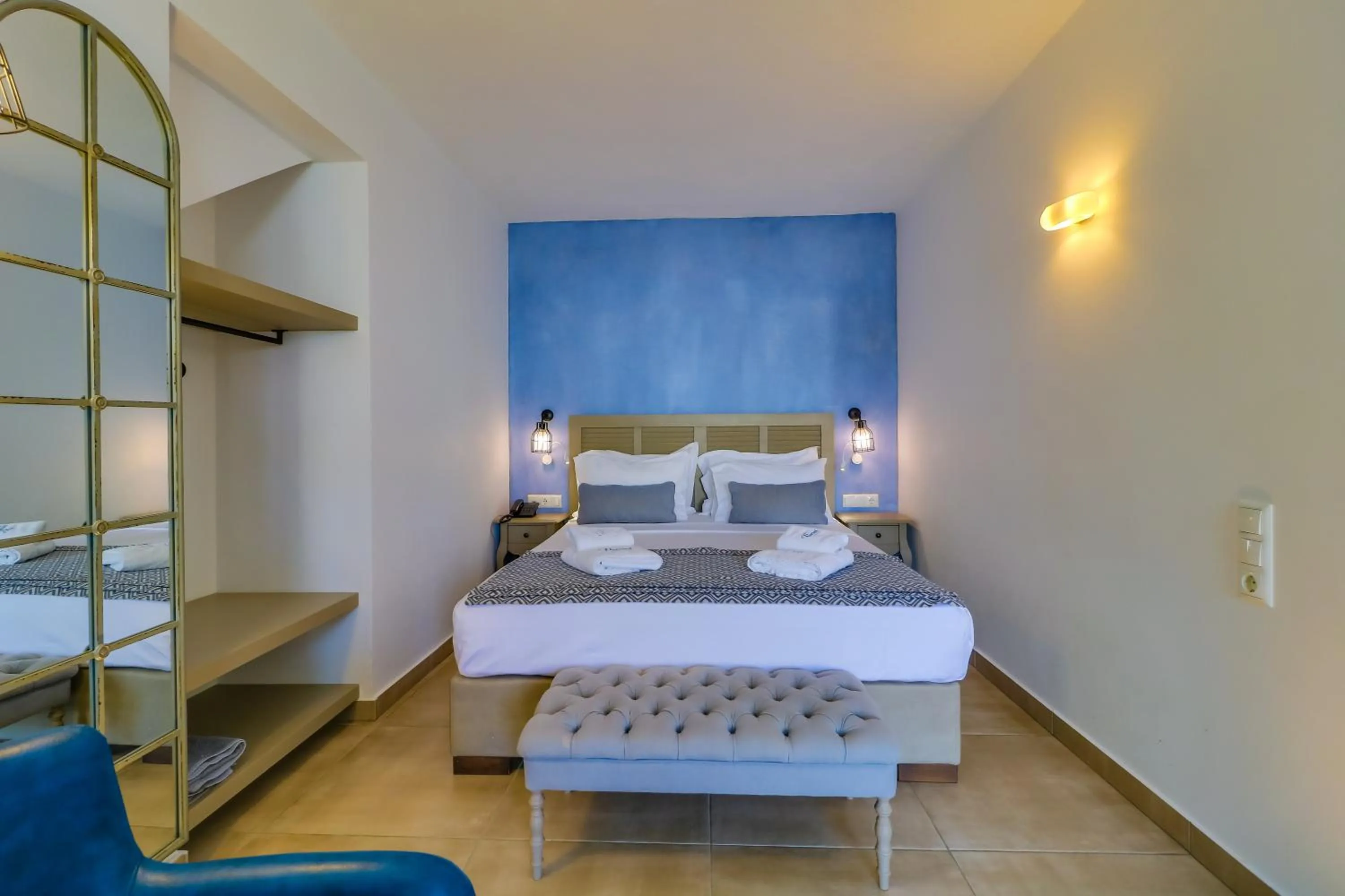 Bed in Theros Villas & Suites