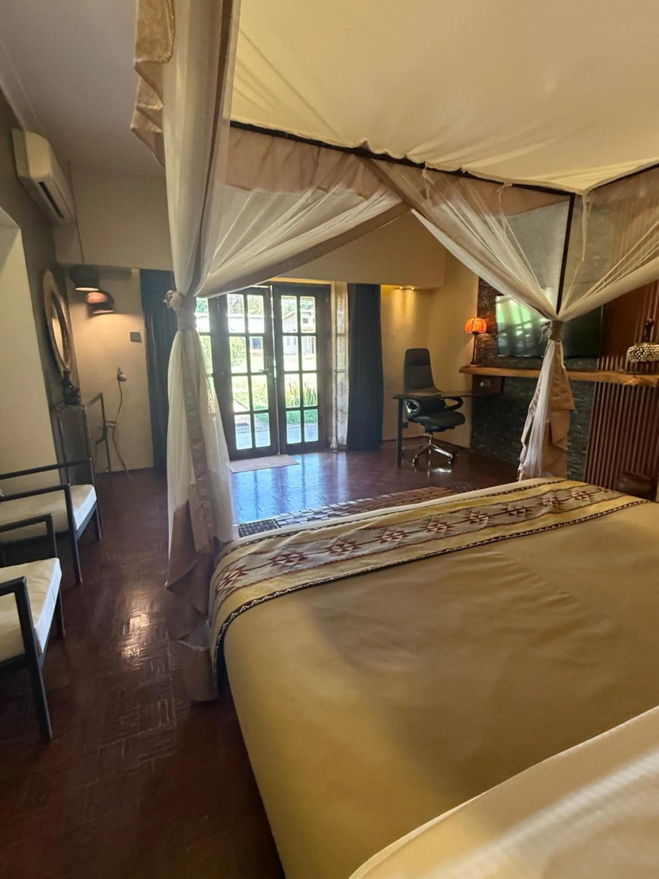 Garden view, Bed in Ameg Lodge Kilimanjaro