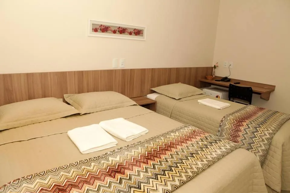 Photo of the whole room, Bed in Siena Hotel