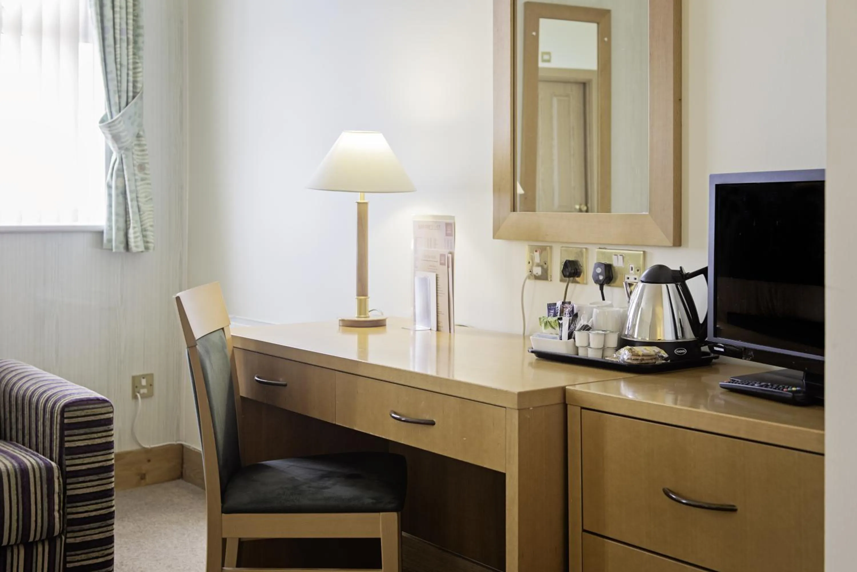 Coffee/tea facilities in Carousel Hotel