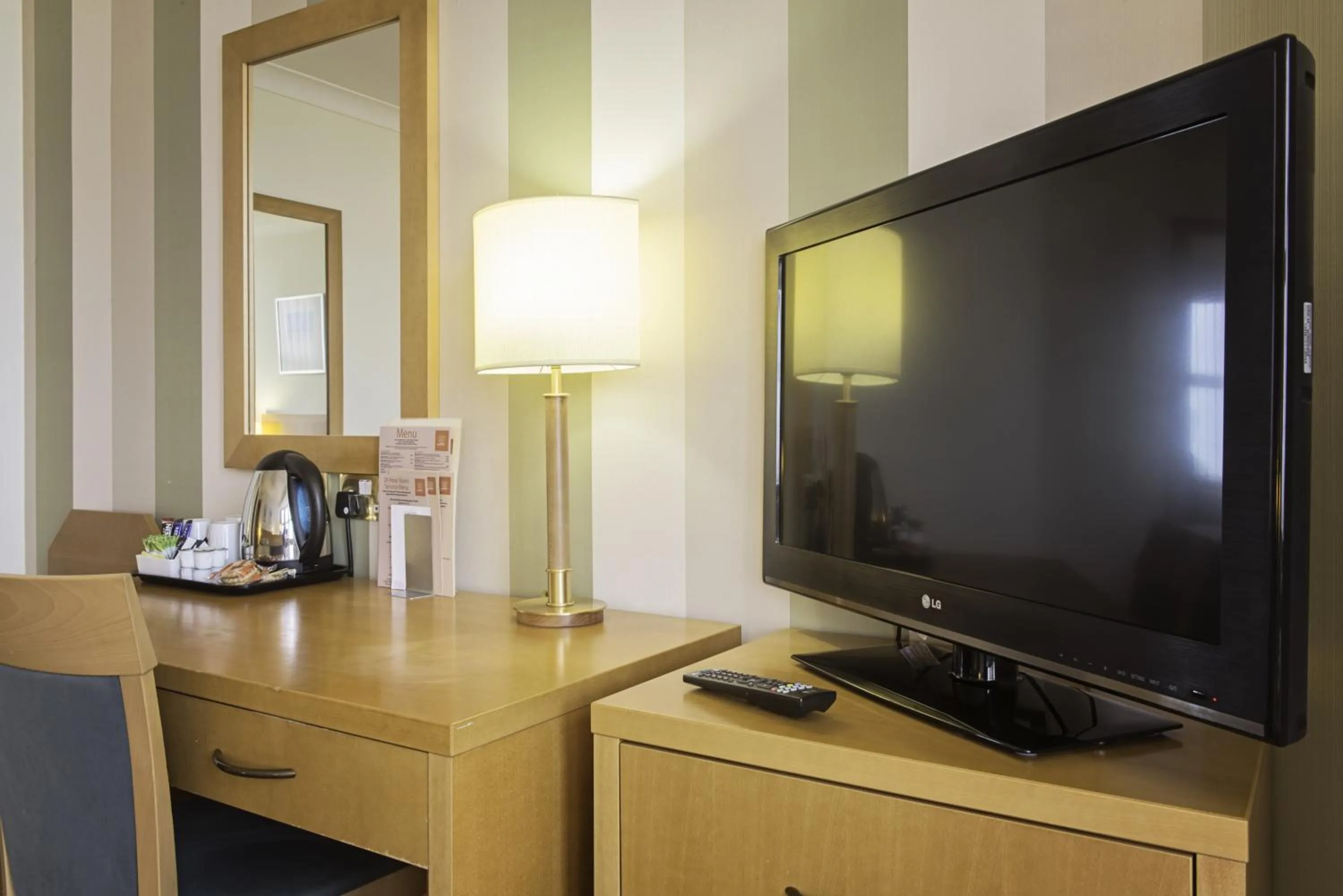 Bedroom in Carousel Hotel