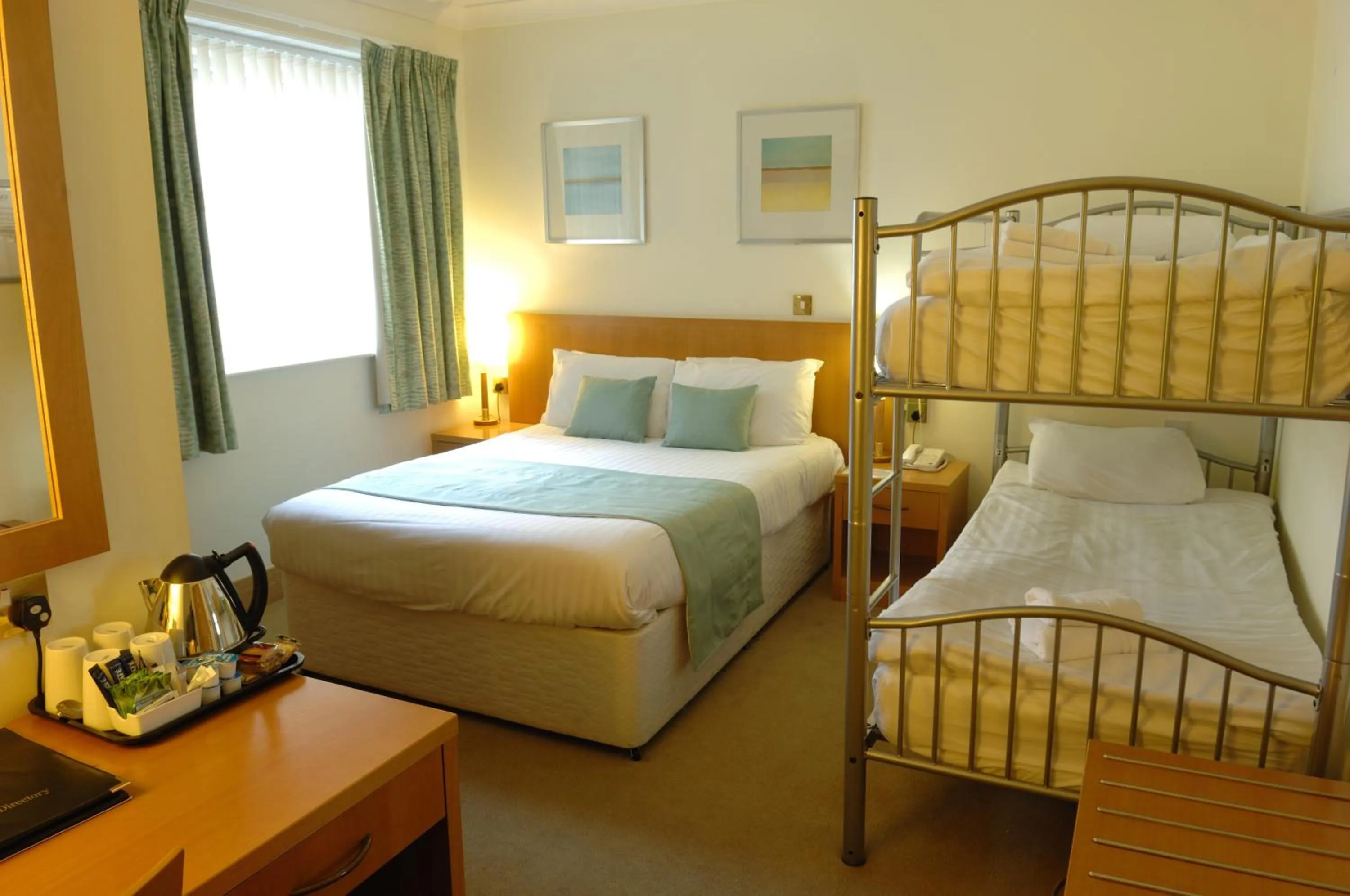 Bed in Carousel Hotel