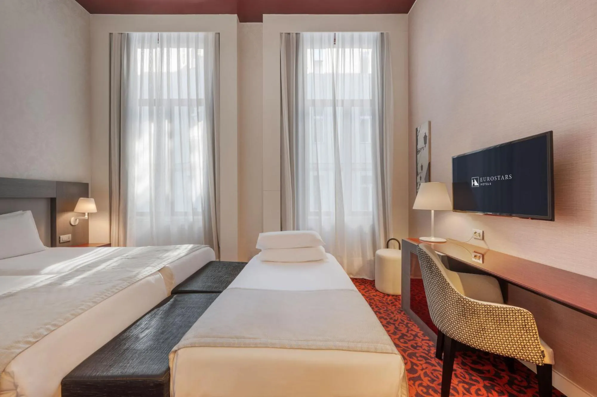 Bed in Eurostars Palazzo Zichy