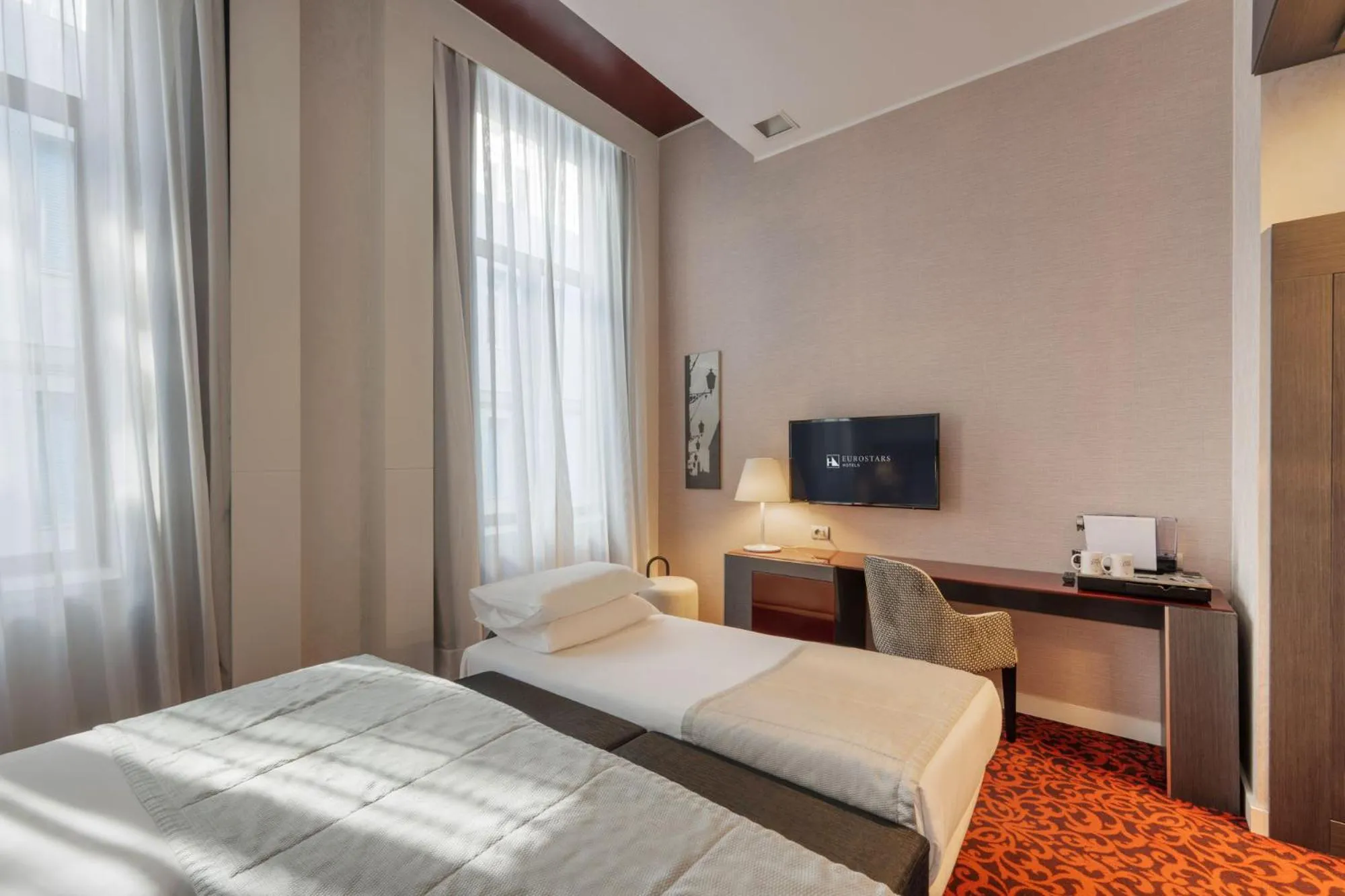 Bed in Eurostars Palazzo Zichy