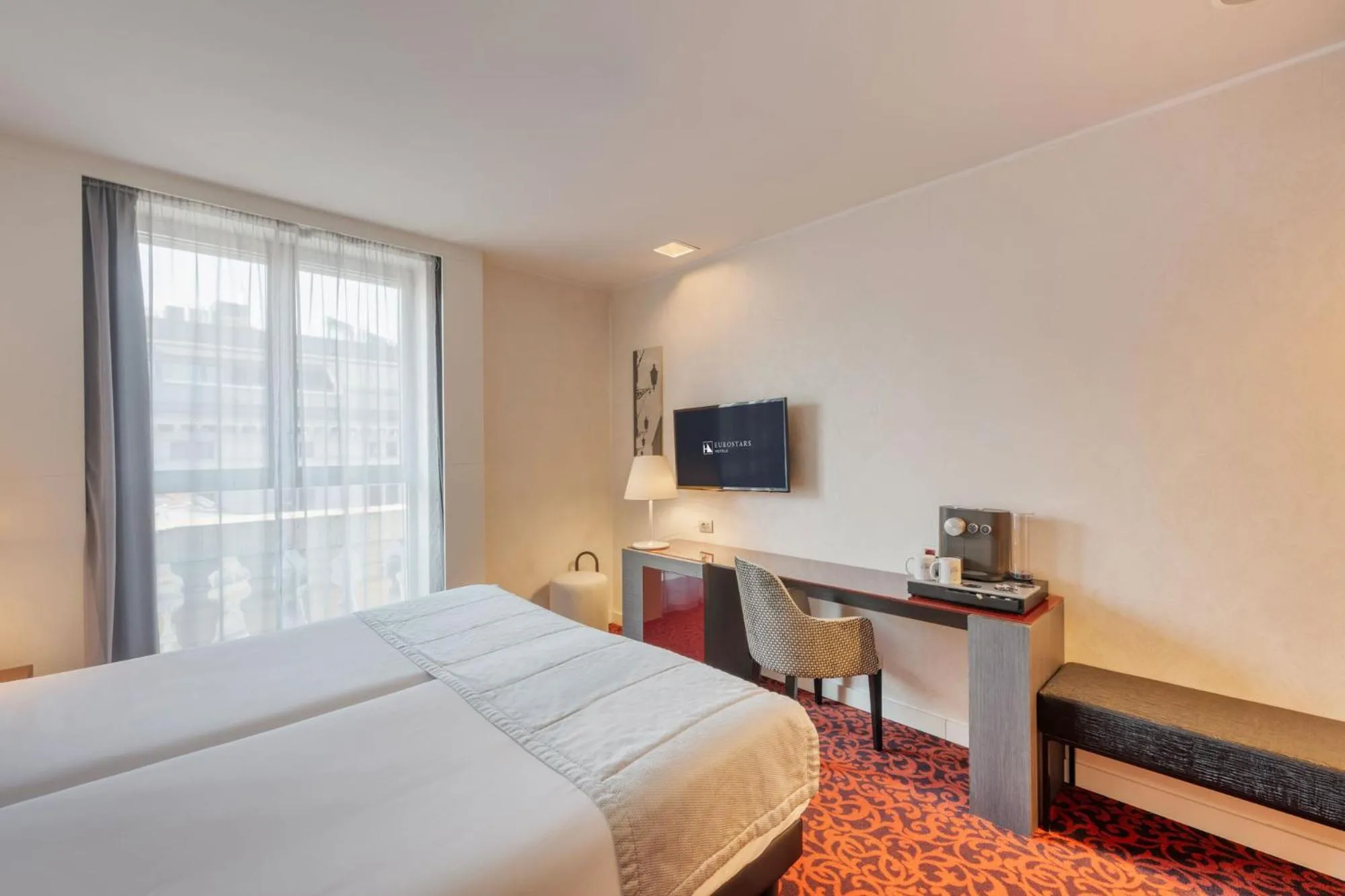 Bed in Eurostars Palazzo Zichy