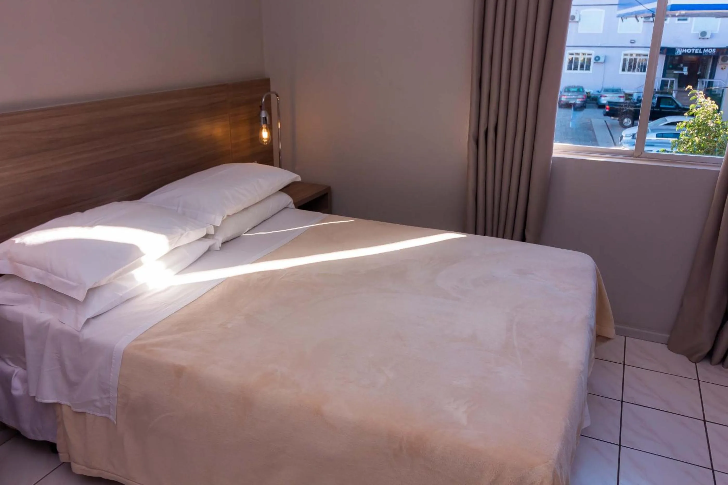 Bed in Kennedy Slim Hotel