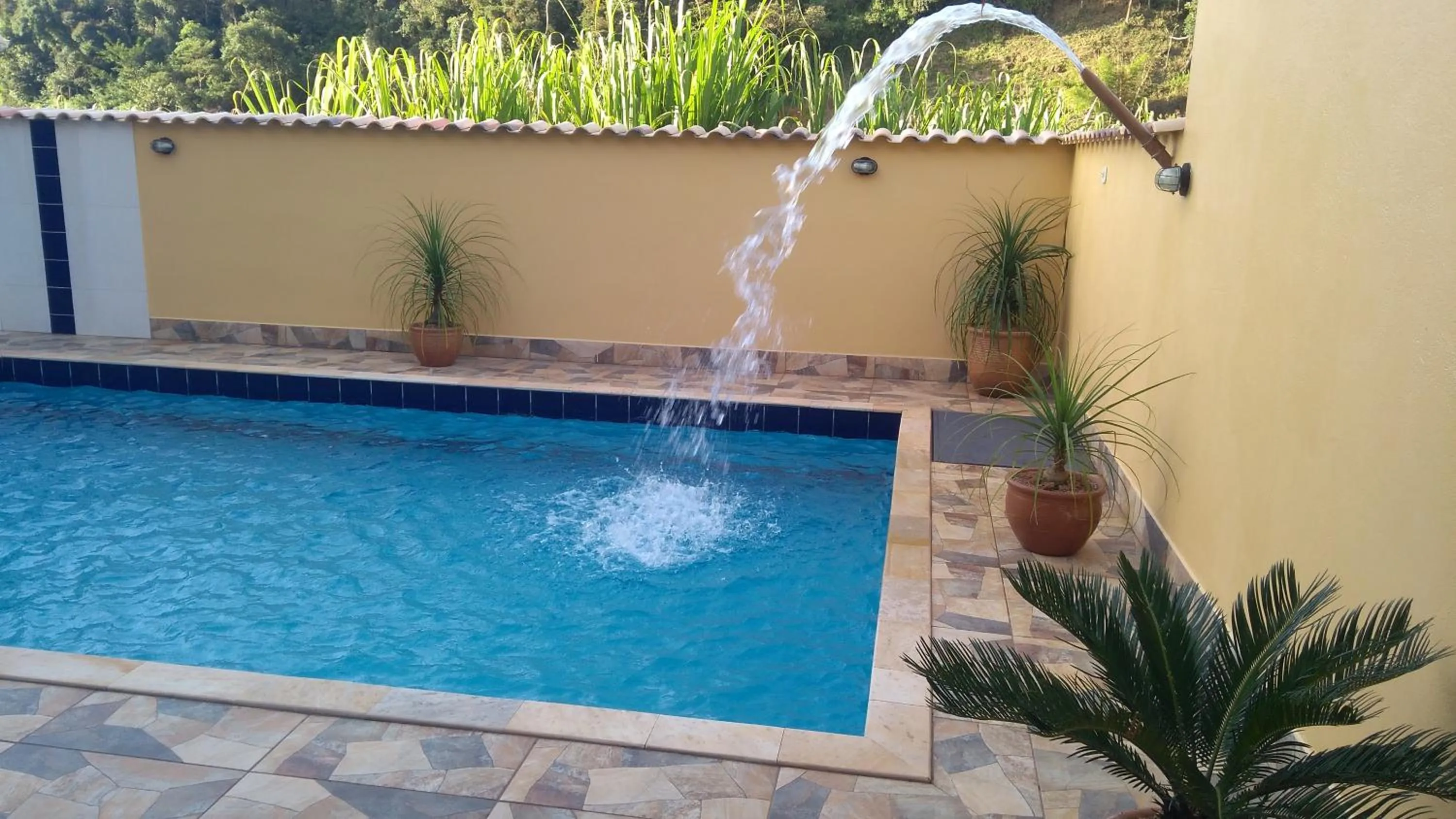 Swimming pool in Pousada Alejandro