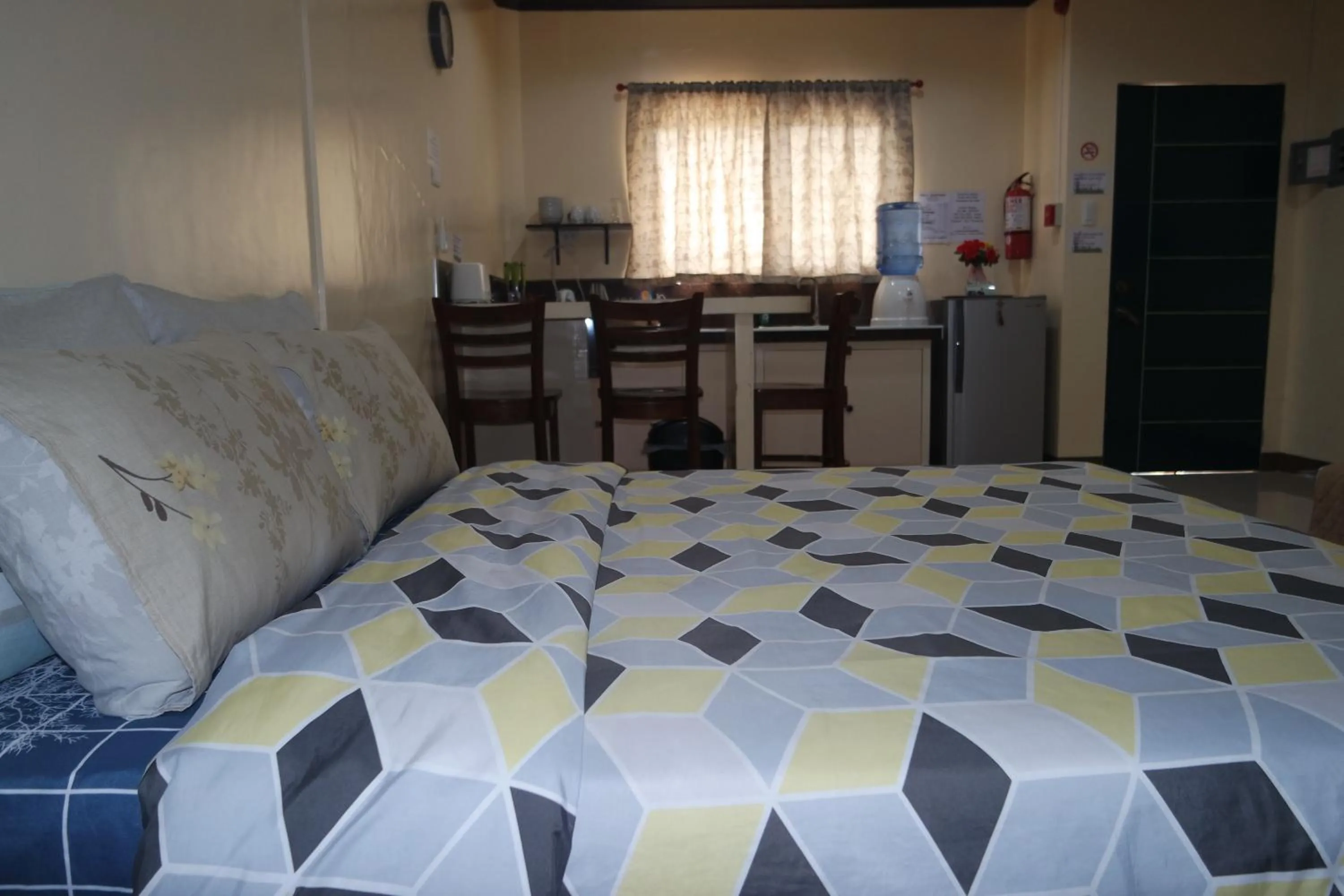 Bed in Yoo C Apartment