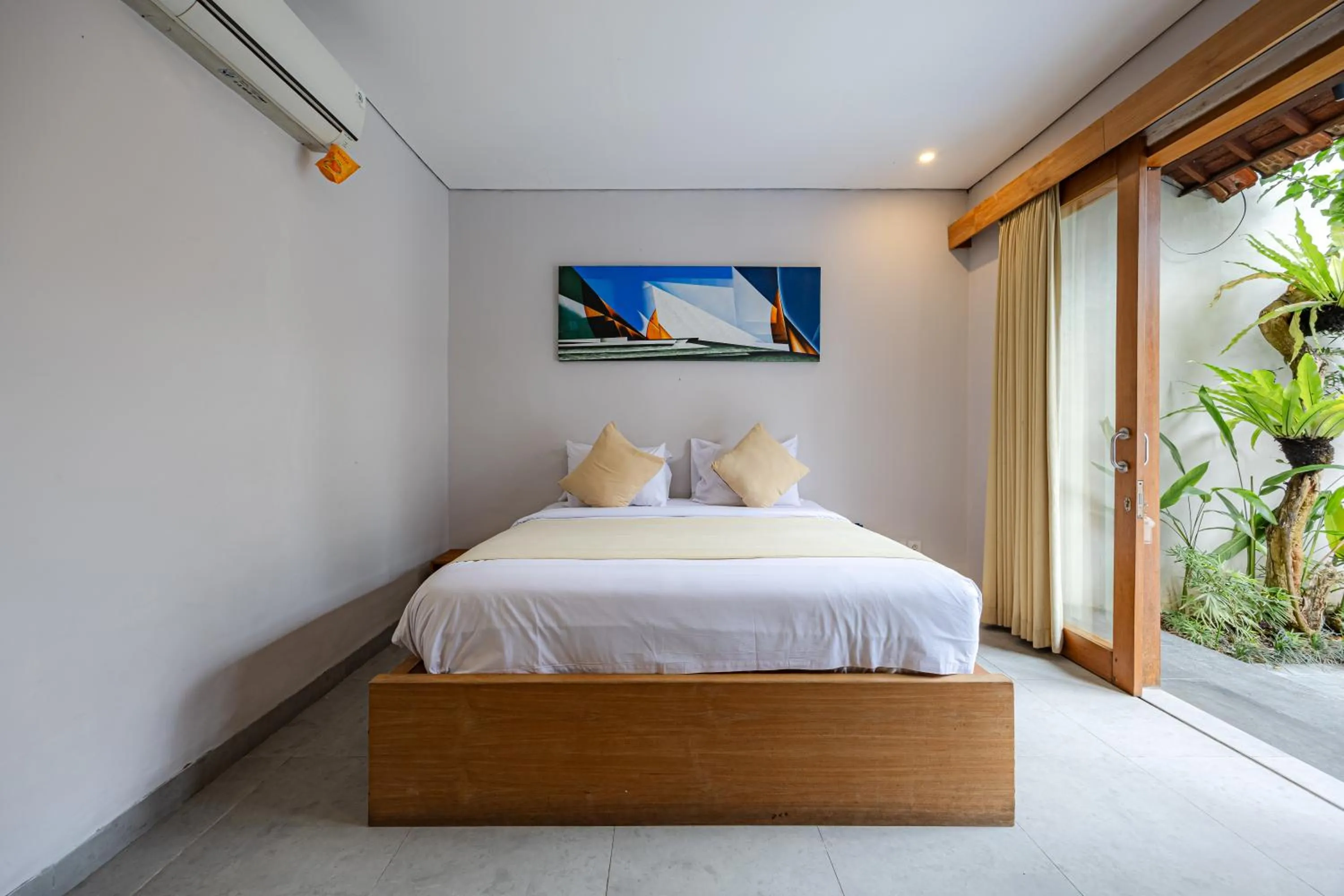 Bed in Apple Villa & Suite Seminyak