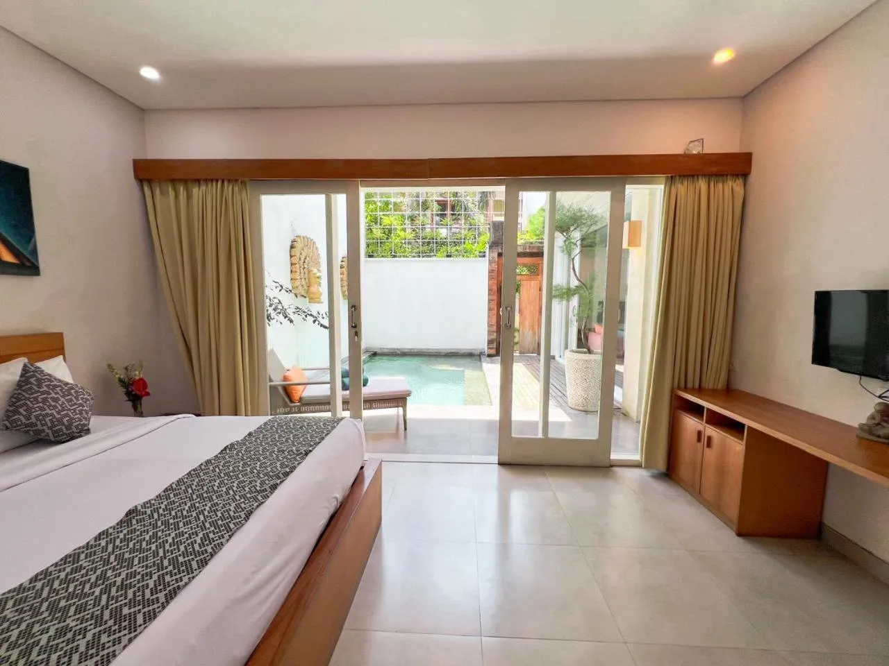 Bed in Apple Villa & Suite Seminyak