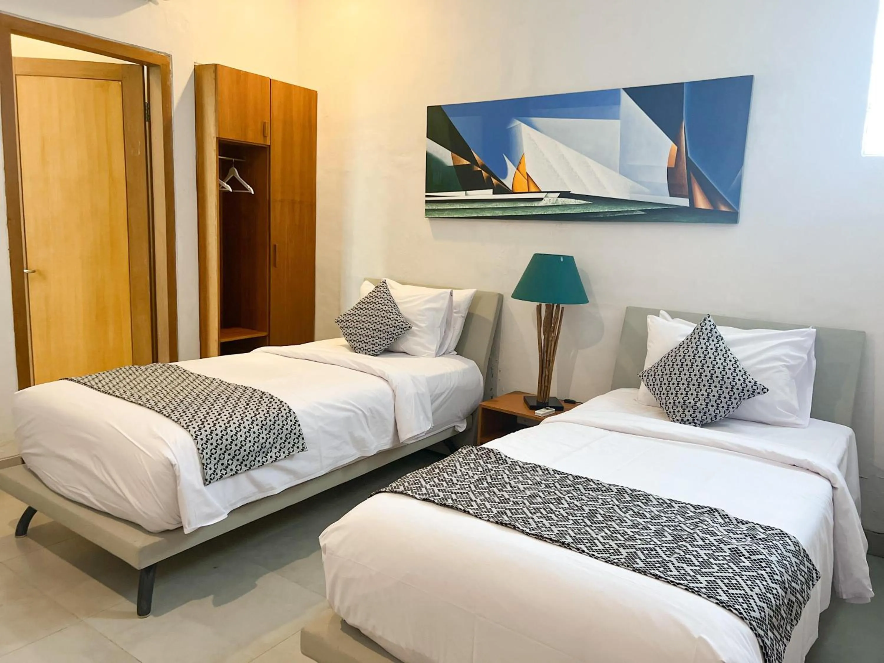 Bed in Apple Villa & Suite Seminyak