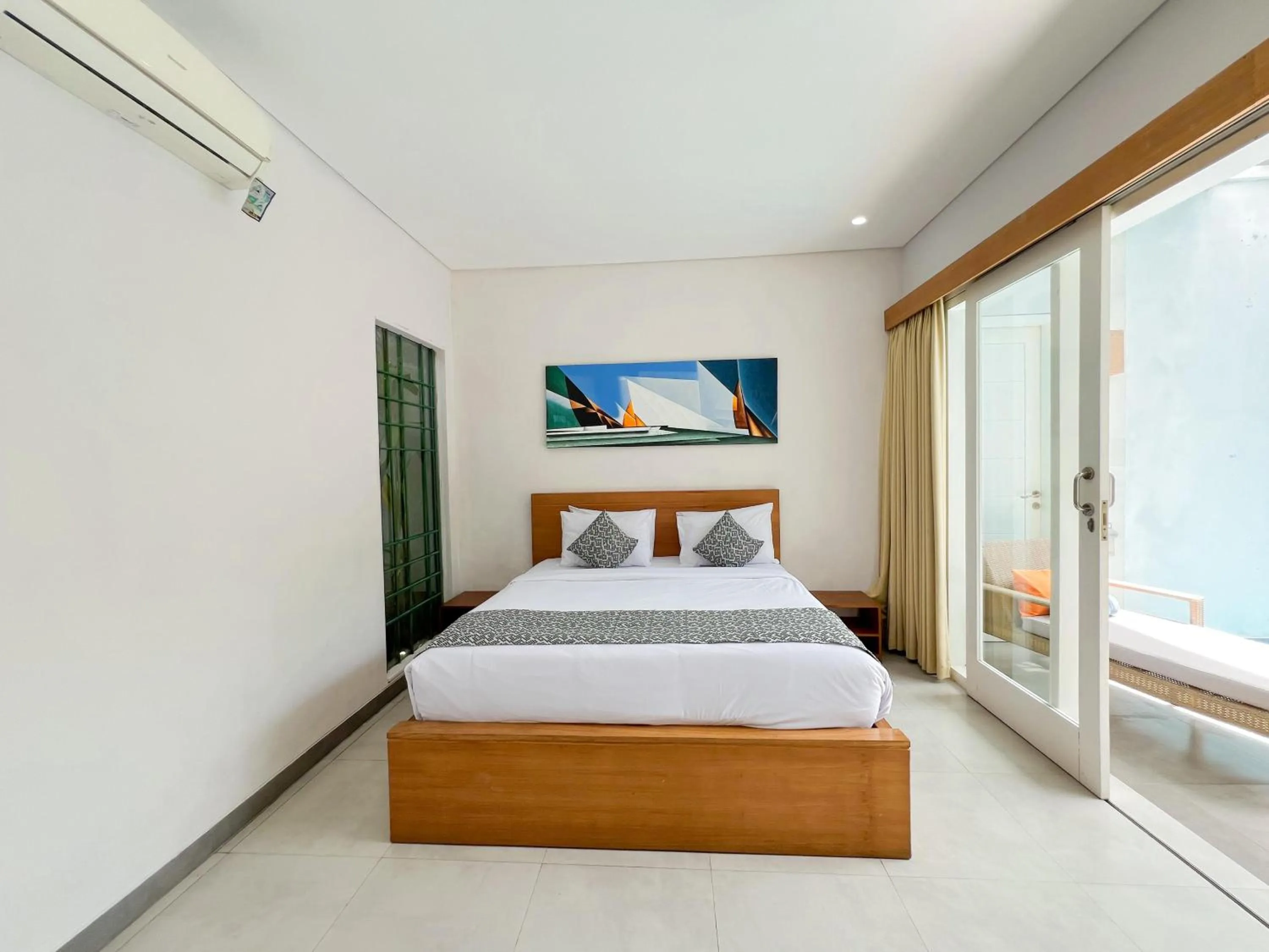 Bed in Apple Villa & Suite Seminyak