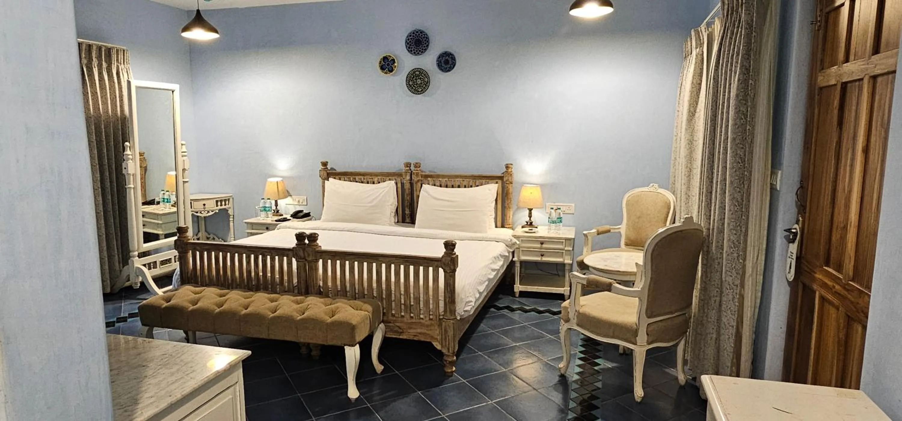 Bed in Amritara Aura Resort & Spa