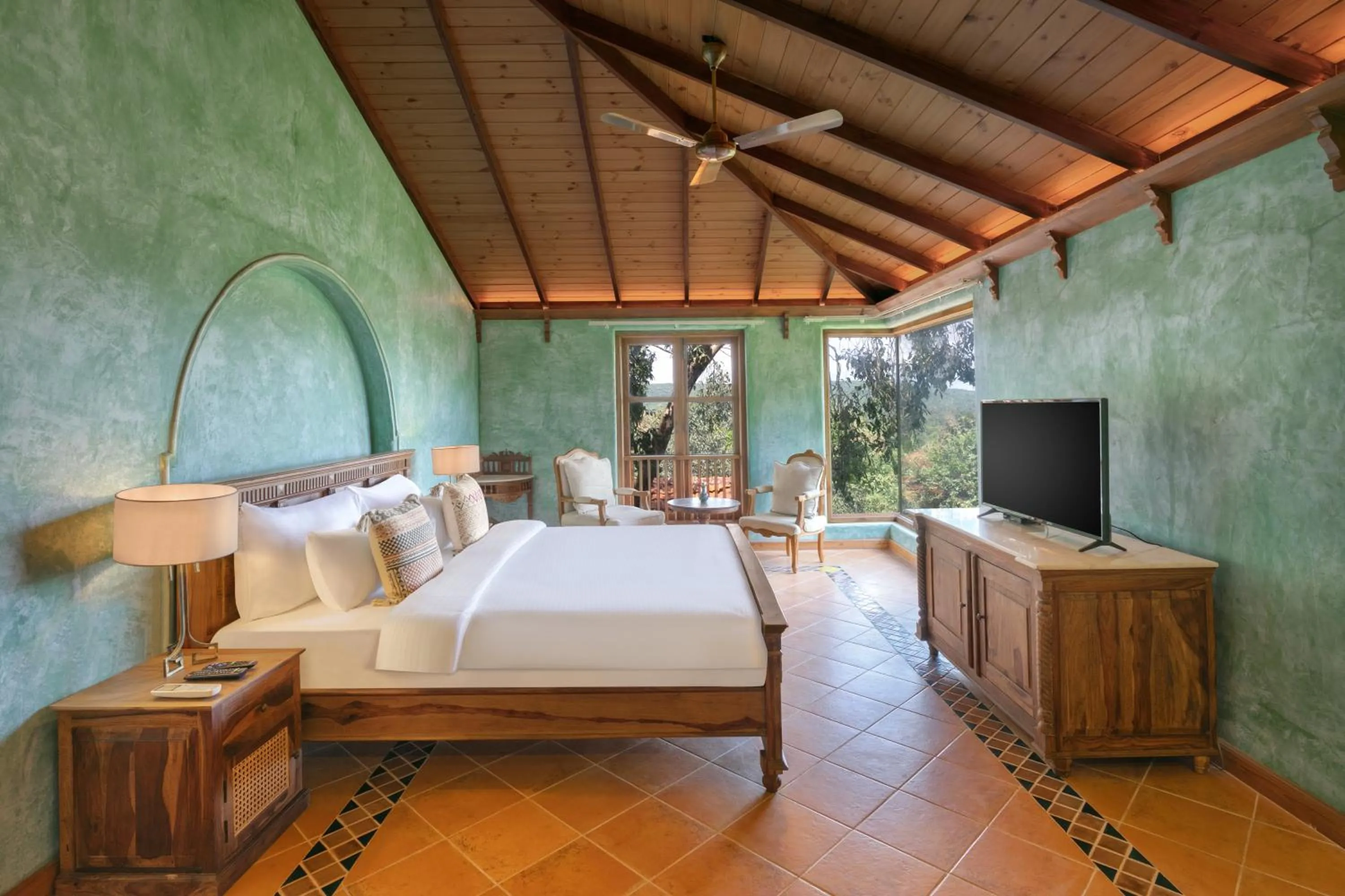 Bed in Amritara Aura Resort & Spa