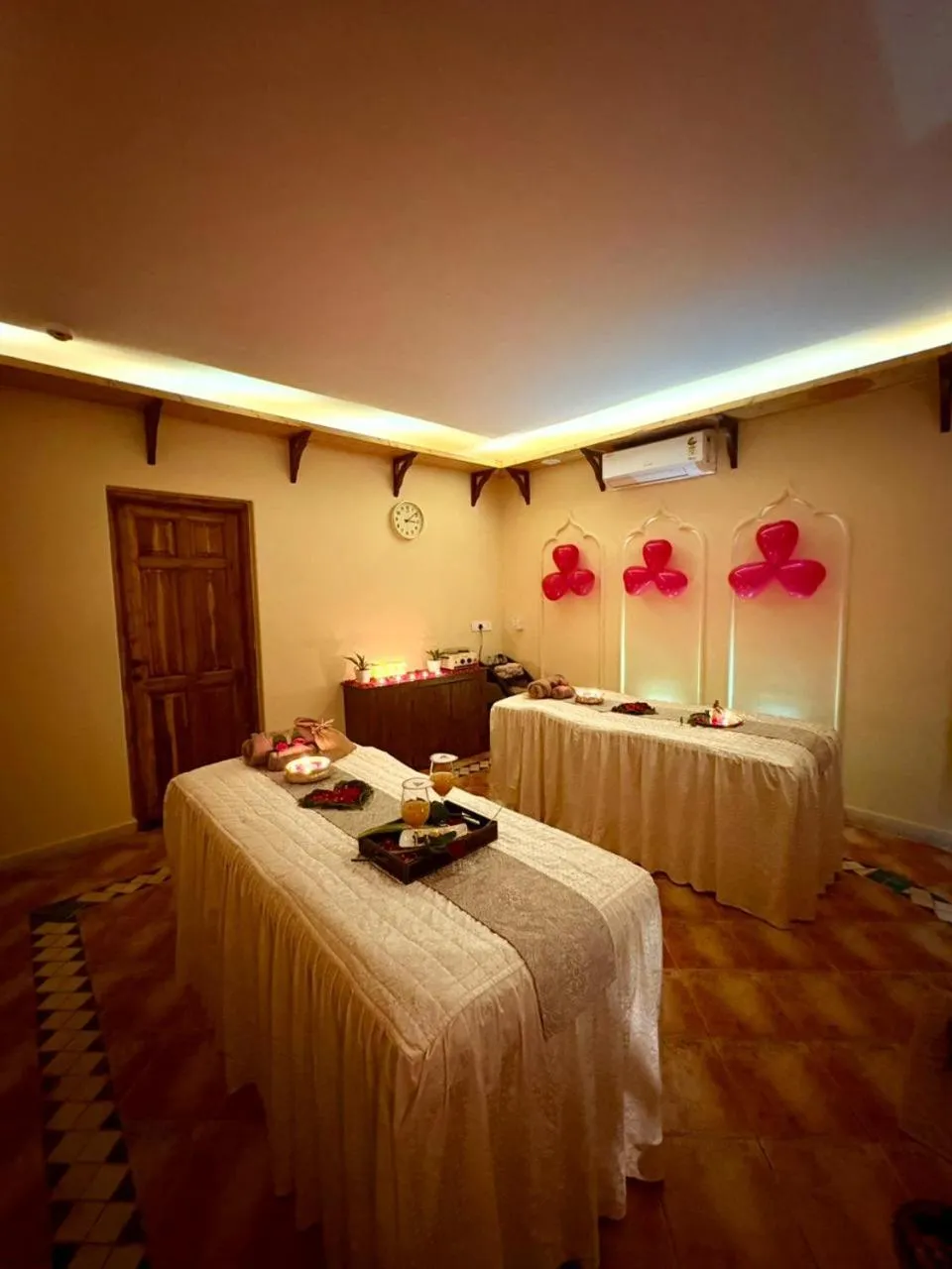 Bed in Amritara Aura Resort & Spa