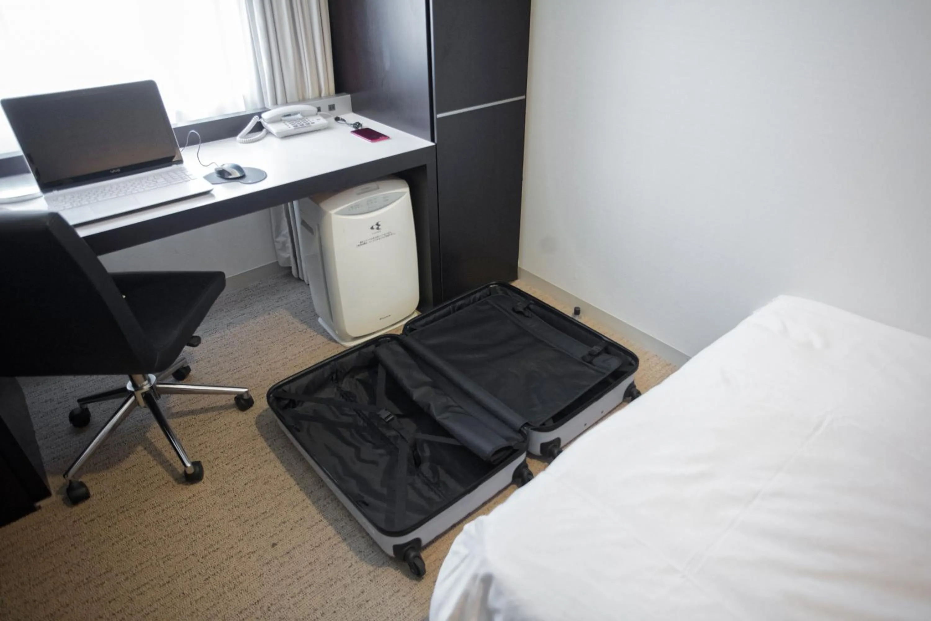 Photo of the whole room, Bed in Cross Wave Umeda