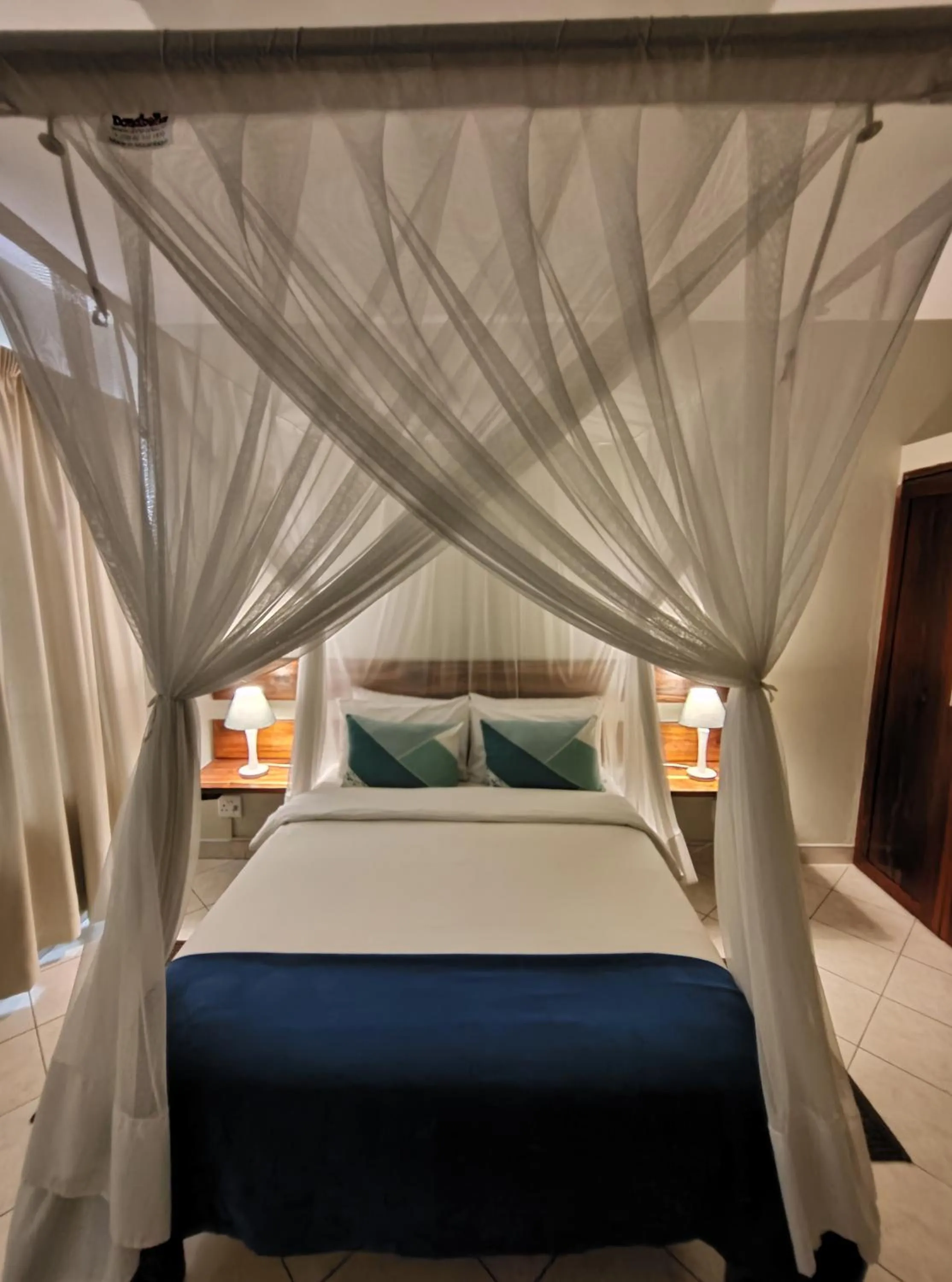 Bed in Sundown Guest House Maputo