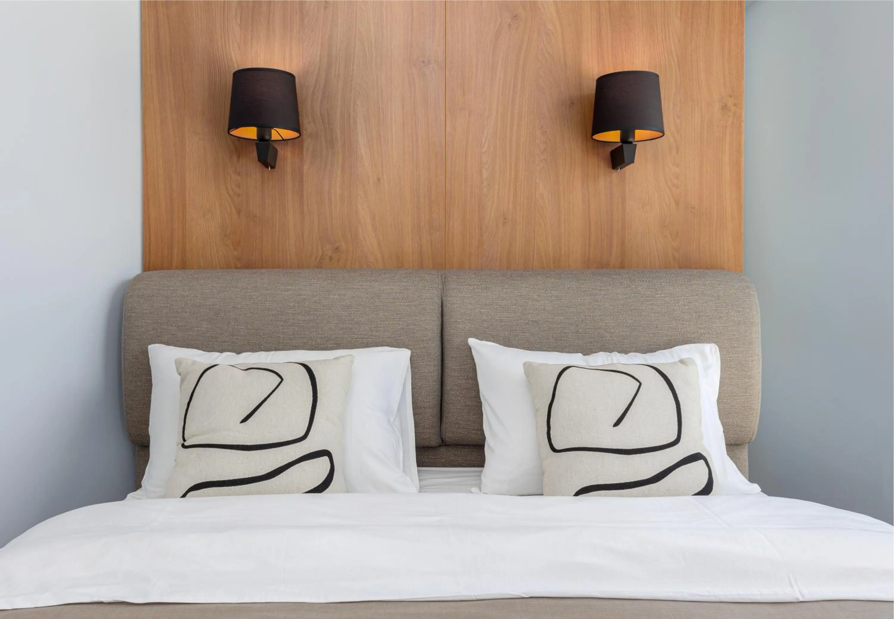 Bed in Hotel Kadmo by Aycon