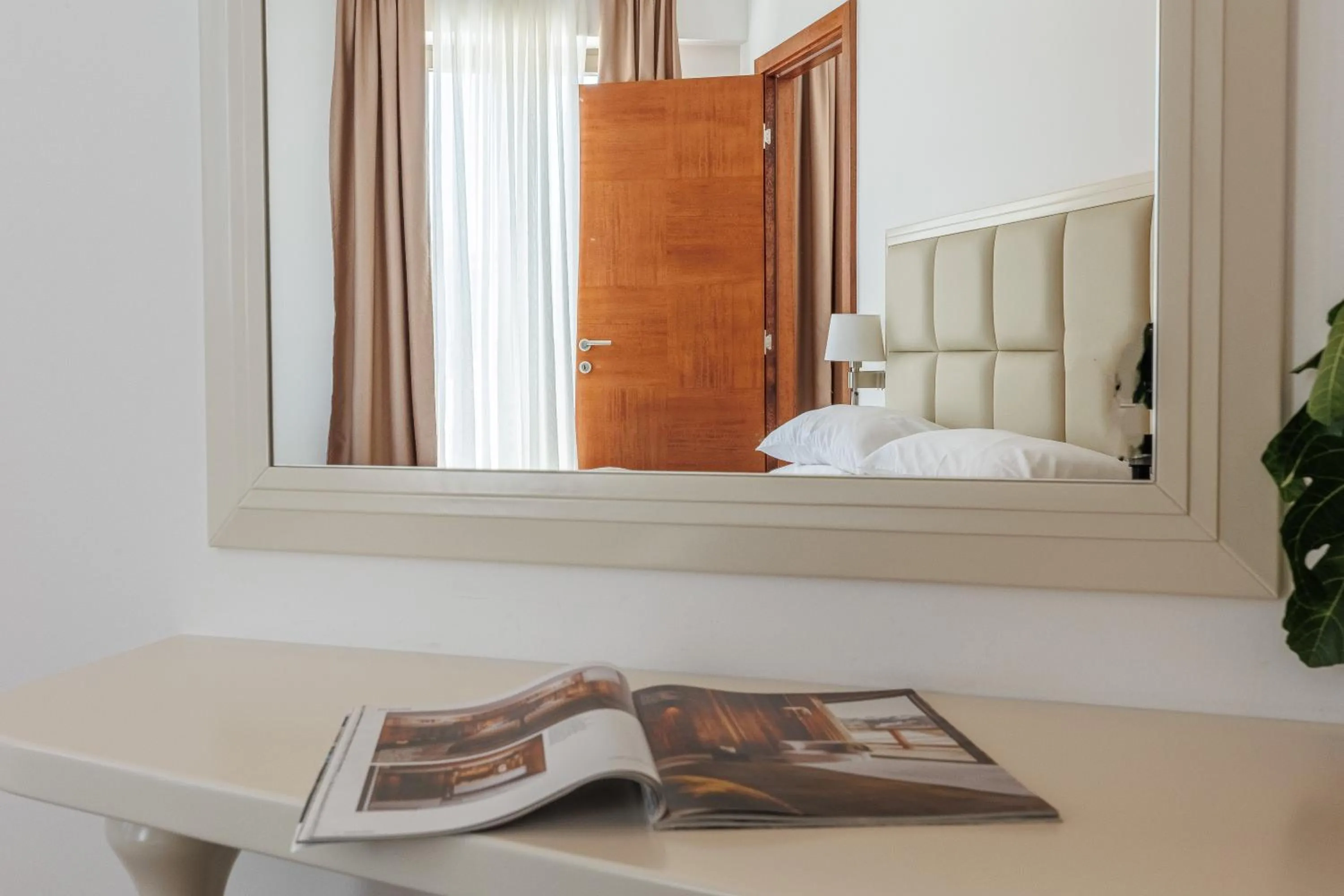 Bed in Hotel Kadmo by Aycon