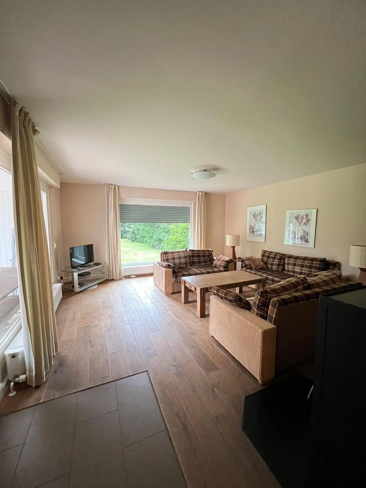 Communal lounge/ TV room in Hotel Hüttmann